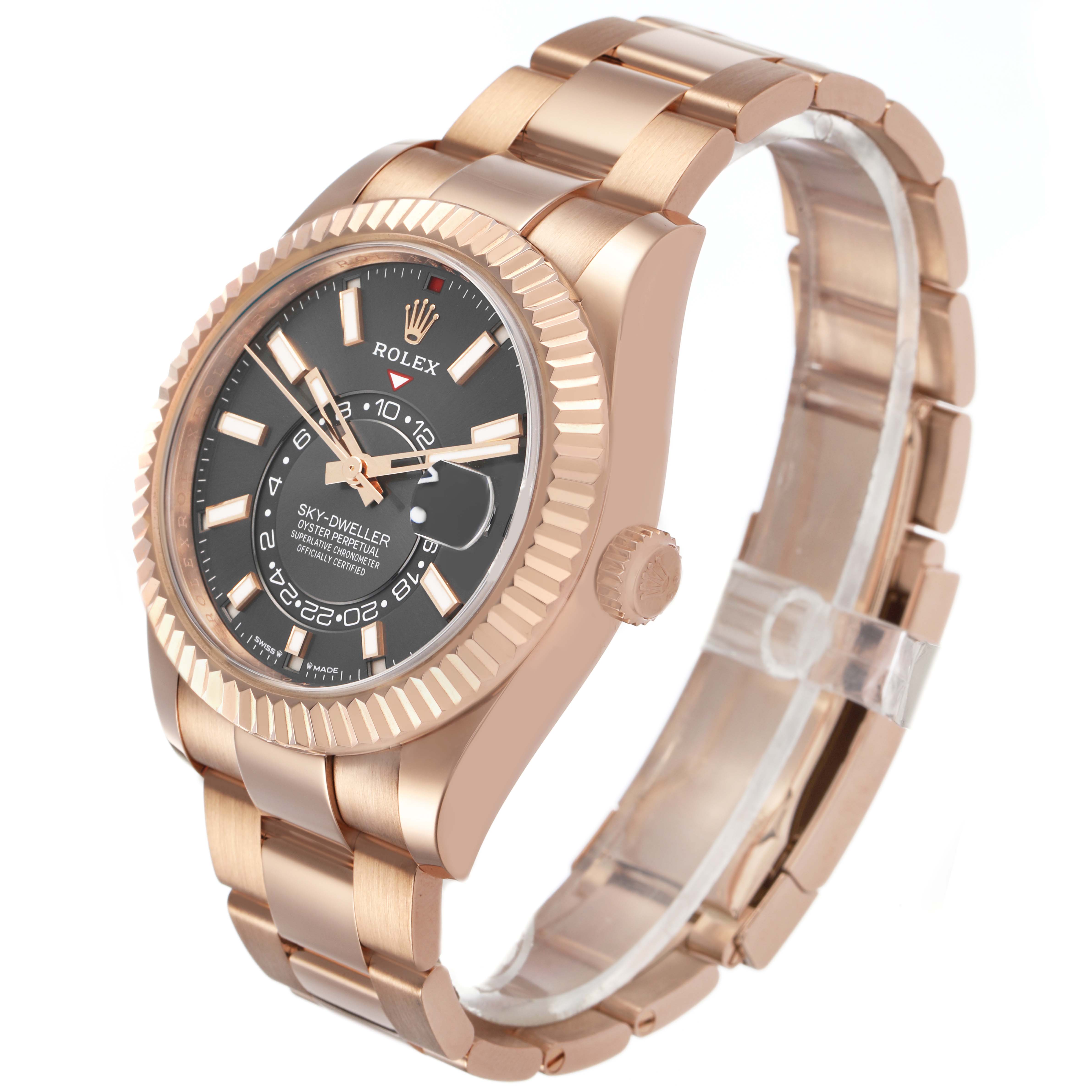 The Rolex Sky-Dweller 336935 Men's Rose Gold Grey Dial is shown at a three-quarter angle, highlighting the dial, bezel, crown, and bracelet.