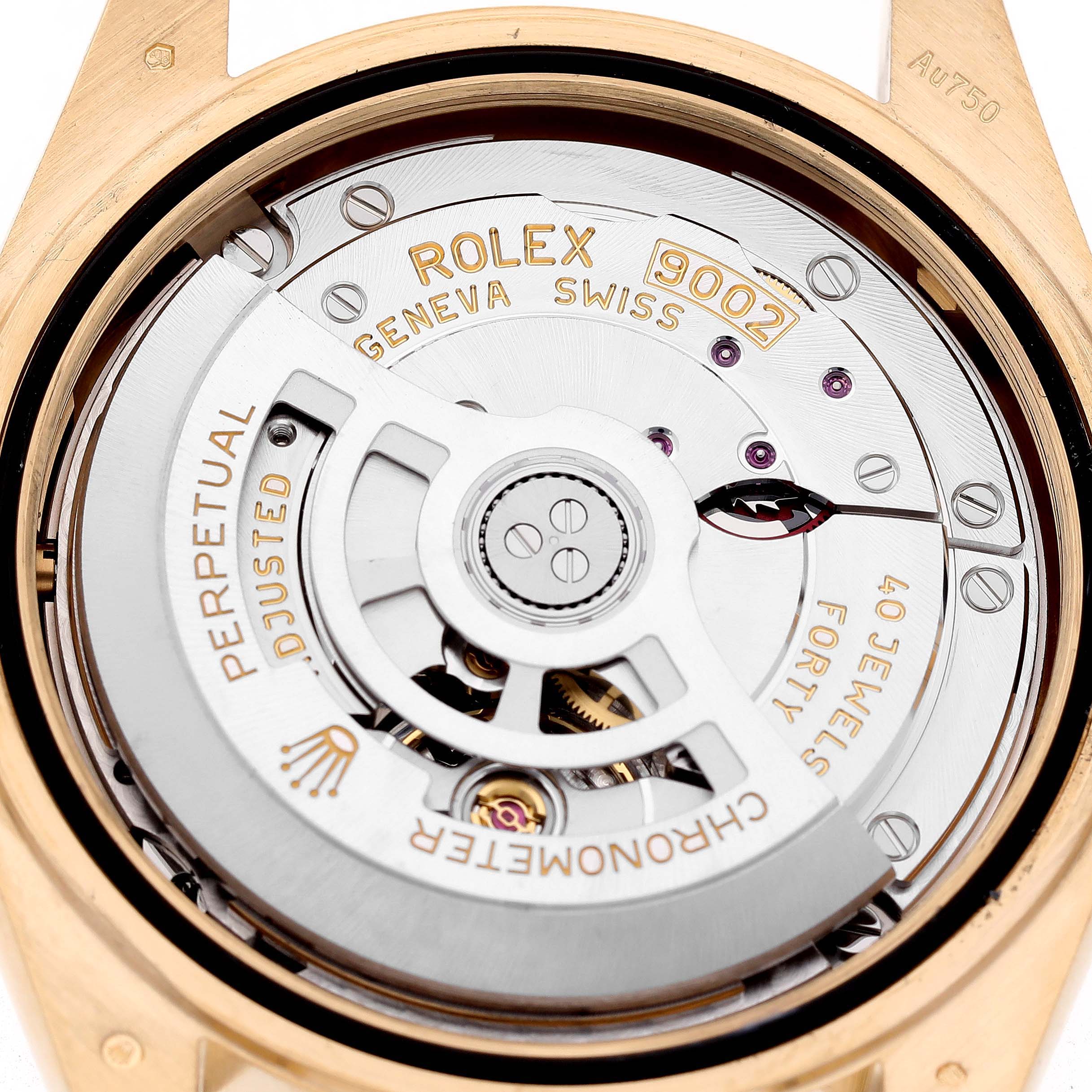 The image shows the movement of a Rolex Sky-Dweller 336938 Men's Yellow Gold White Dial watch from a top-down angle.