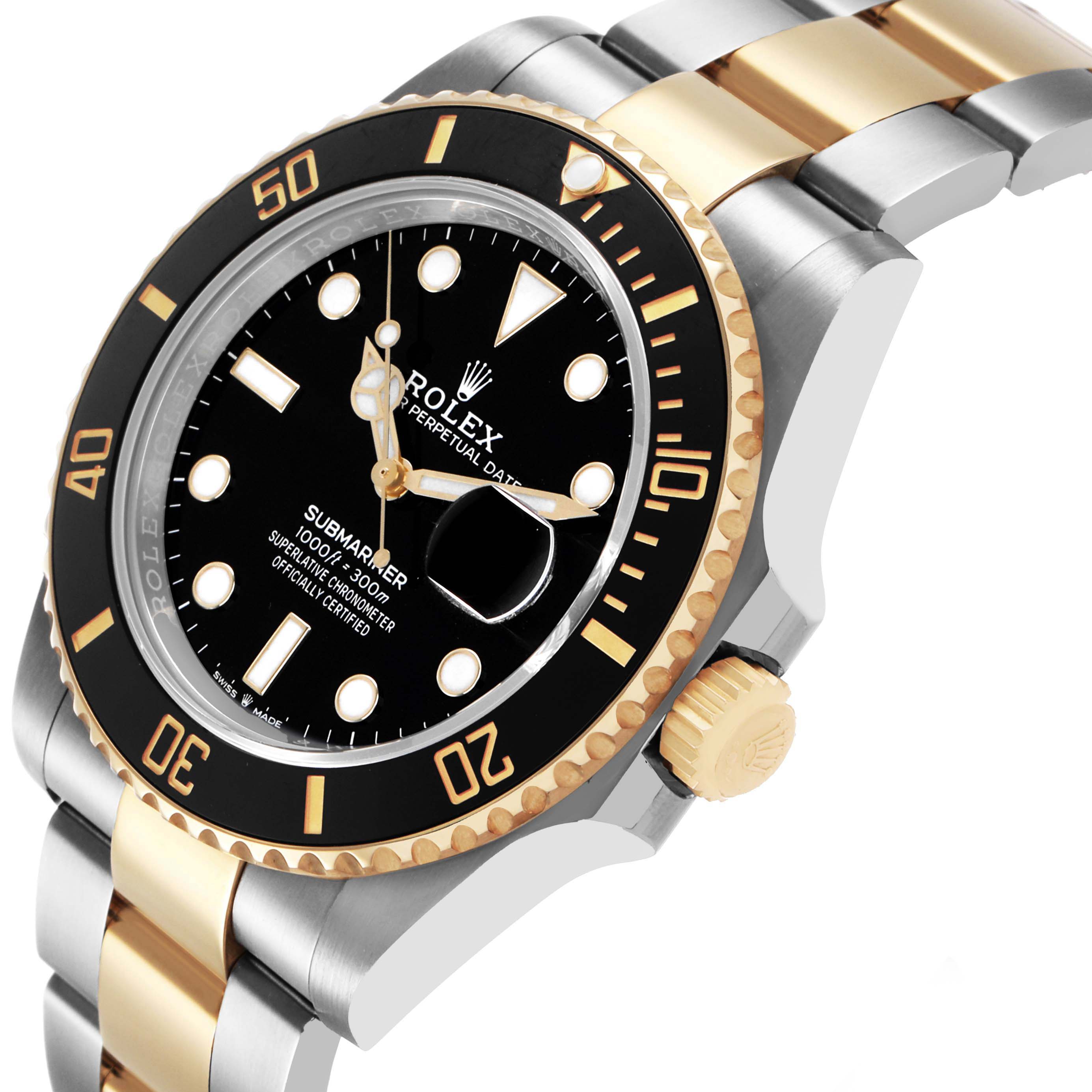 The Rolex Submariner 126613 Men's Steel and Gold (two tone) Black Dial watch is shown at an angled side view, highlighting its bezel, dial, crown, and bracelet.