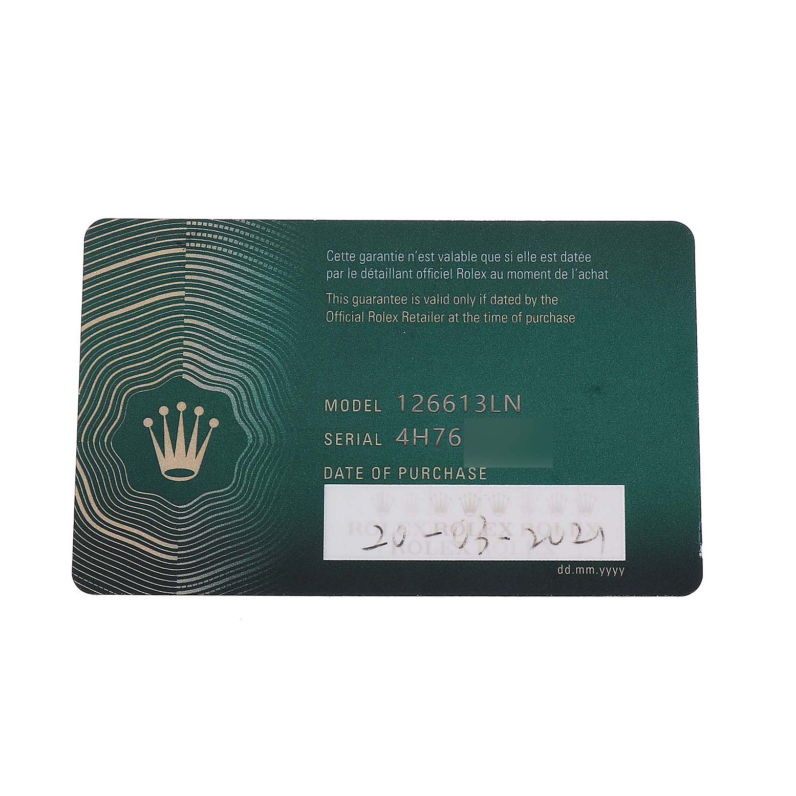 The image shows a Rolex Submariner 126613 Men's Steel and Gold (two tone) Black Dial model 126613LN warranty card from a top-down angle.