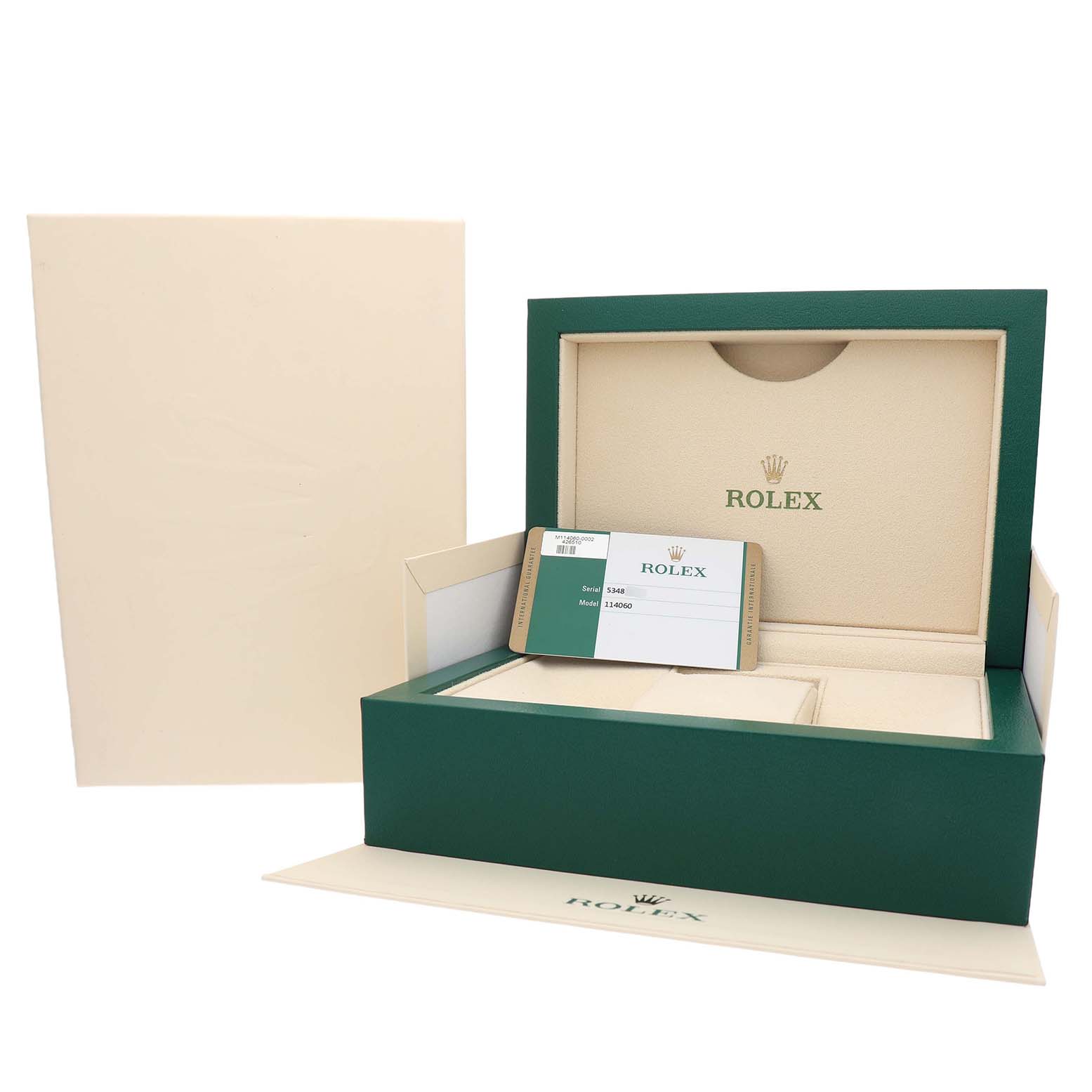The image shows a Rolex Submariner 114060 Men's Stainless Steel Black Dial box set including an open green and beige box with a warranty card.