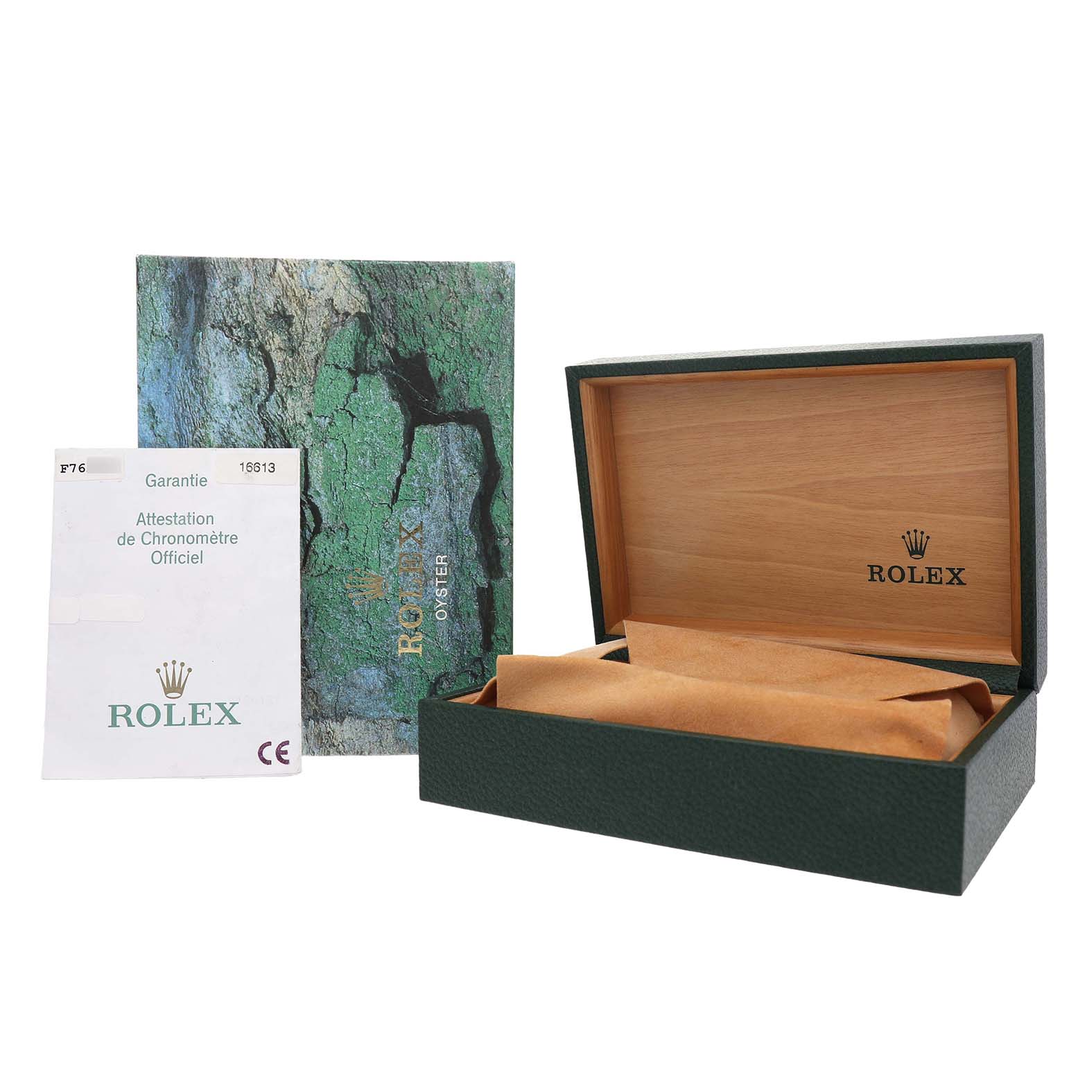 The image shows the packaging and warranty card of a Rolex Submariner 16613 Men's Steel and Gold (two tone) Blue Dial, featuring an open box and documentation.