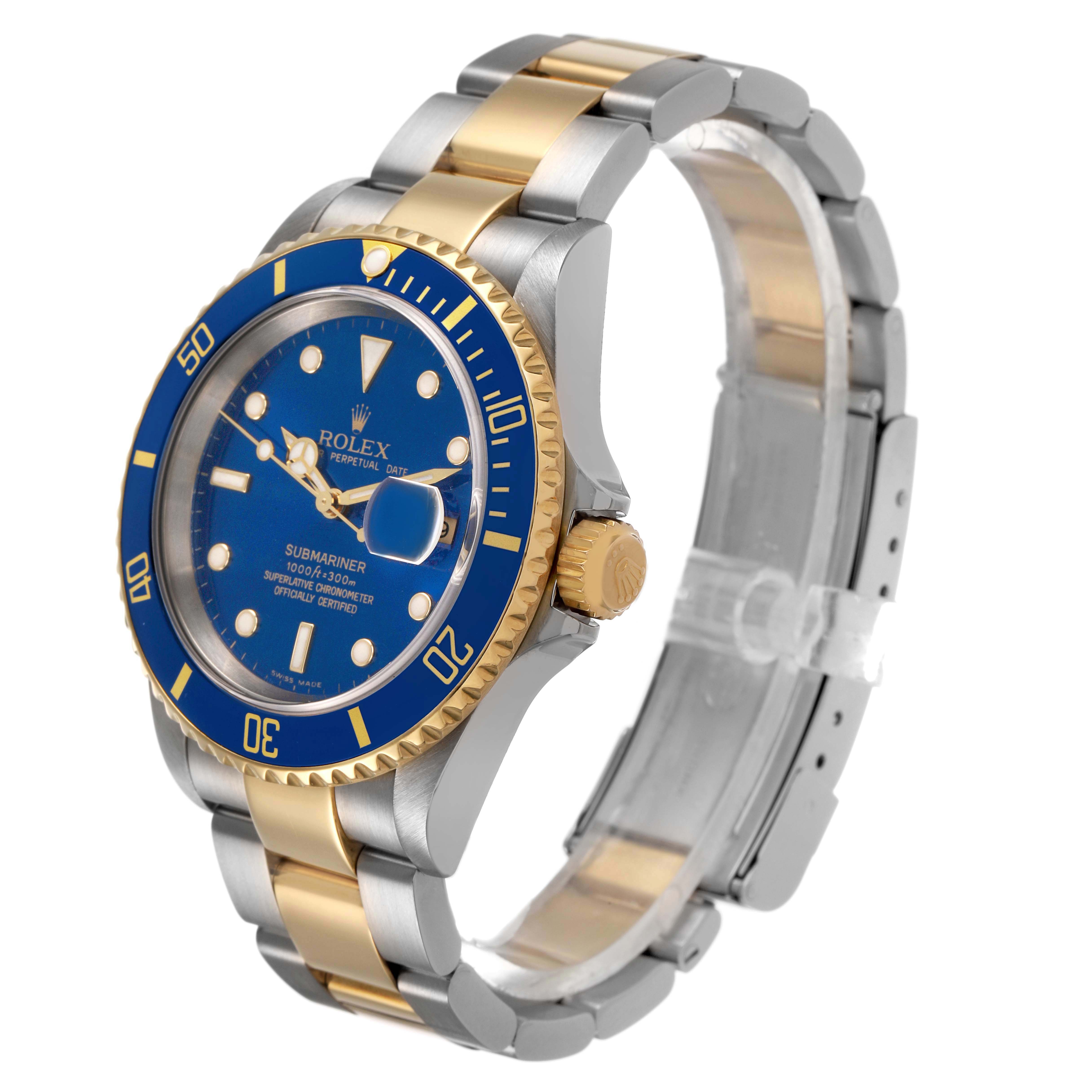 The Rolex Submariner 16613 Men's Steel and Gold (two tone) Blue Dial watch is shown at a front-side angle, displaying its blue dial, two-tone bracelet, and gold bezel.