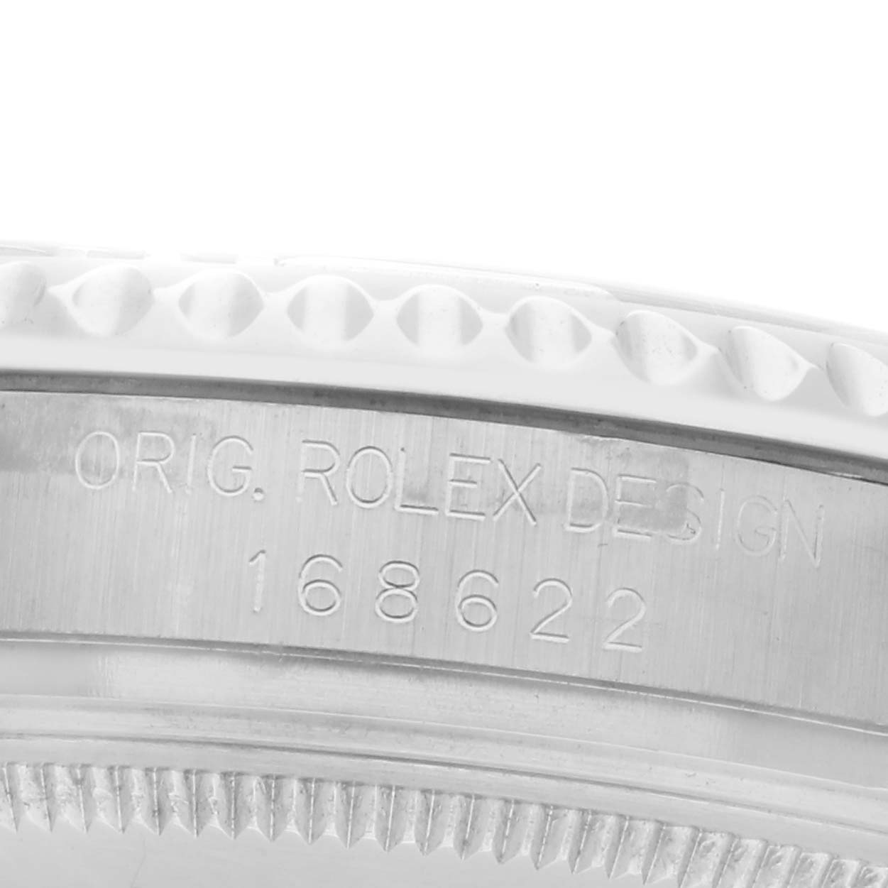 The image shows a close-up of the side of a Rolex Yacht-Master 168622 Men
s Stainless Steel Silver Dial 168622 Men
s Stainless Steel Silver Dial watch, highlighting the engraved bezel and model number.