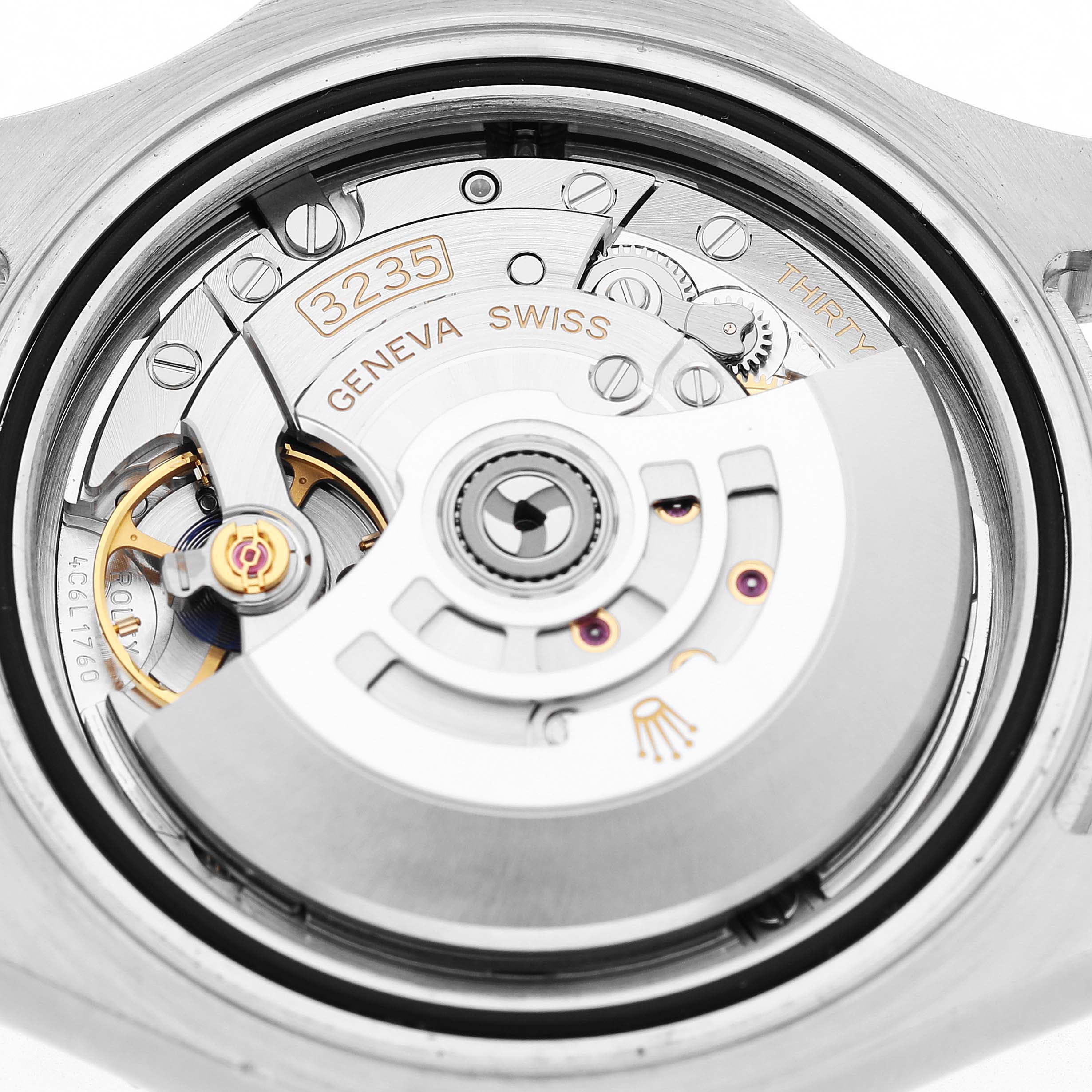 The image shows the movement of a Rolex Yacht-Master 126622 Men's Stainless Steel Blue Dial watch viewed from the back, highlighting its internal mechanical components.
