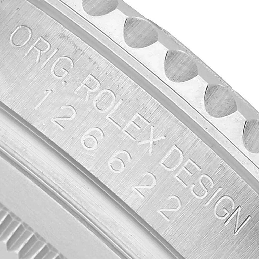 The image shows a close-up of the side of a Rolex Yacht-Master 126622 Men's Stainless Steel Blue Dial watch, highlighting the engraved model number and design details.