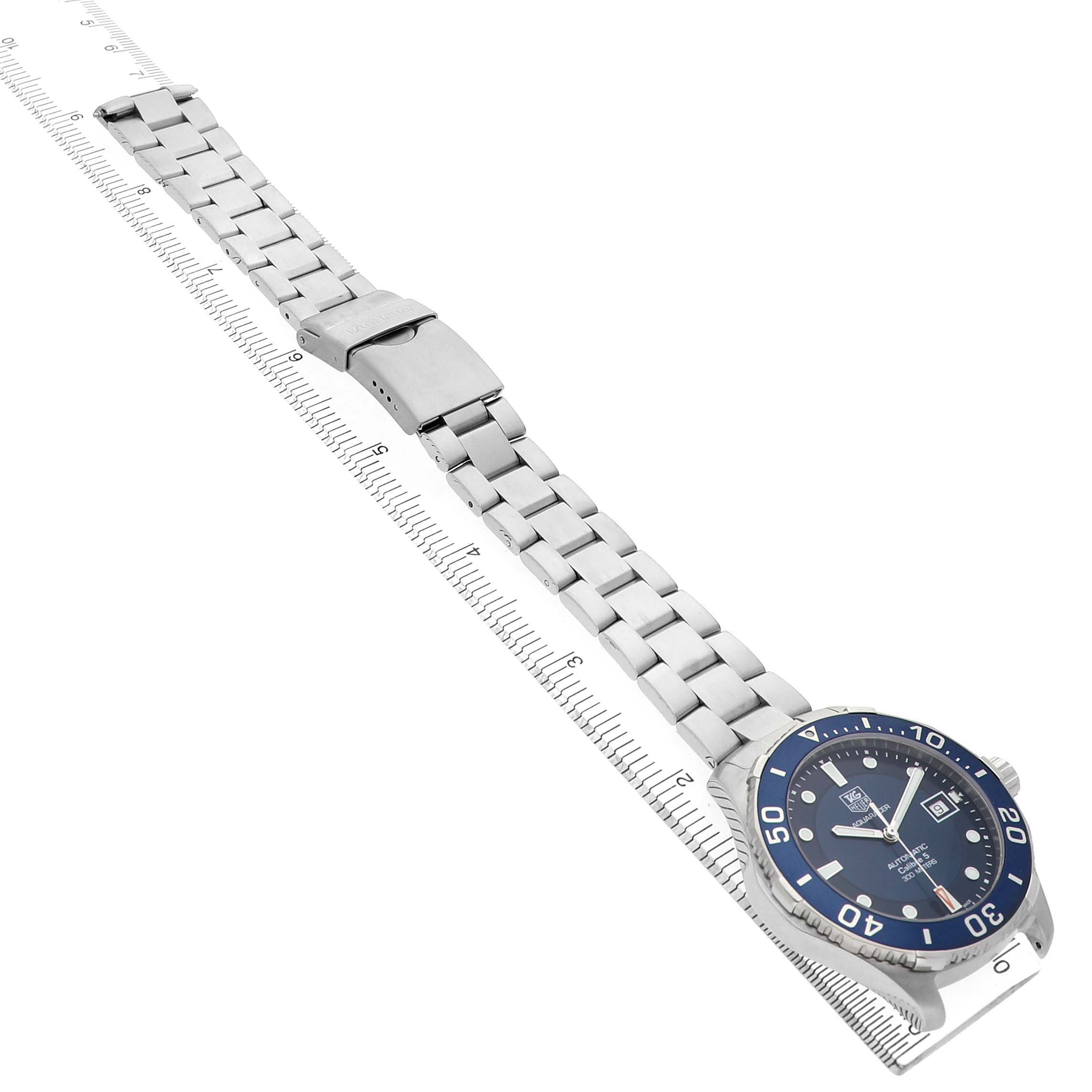 The Tag Heuer Aquaracer WAN2111 Men's Stainless Steel Blue Dial watch is shown at an angled side view, displaying the face, bezel, bracelet, and clasp.