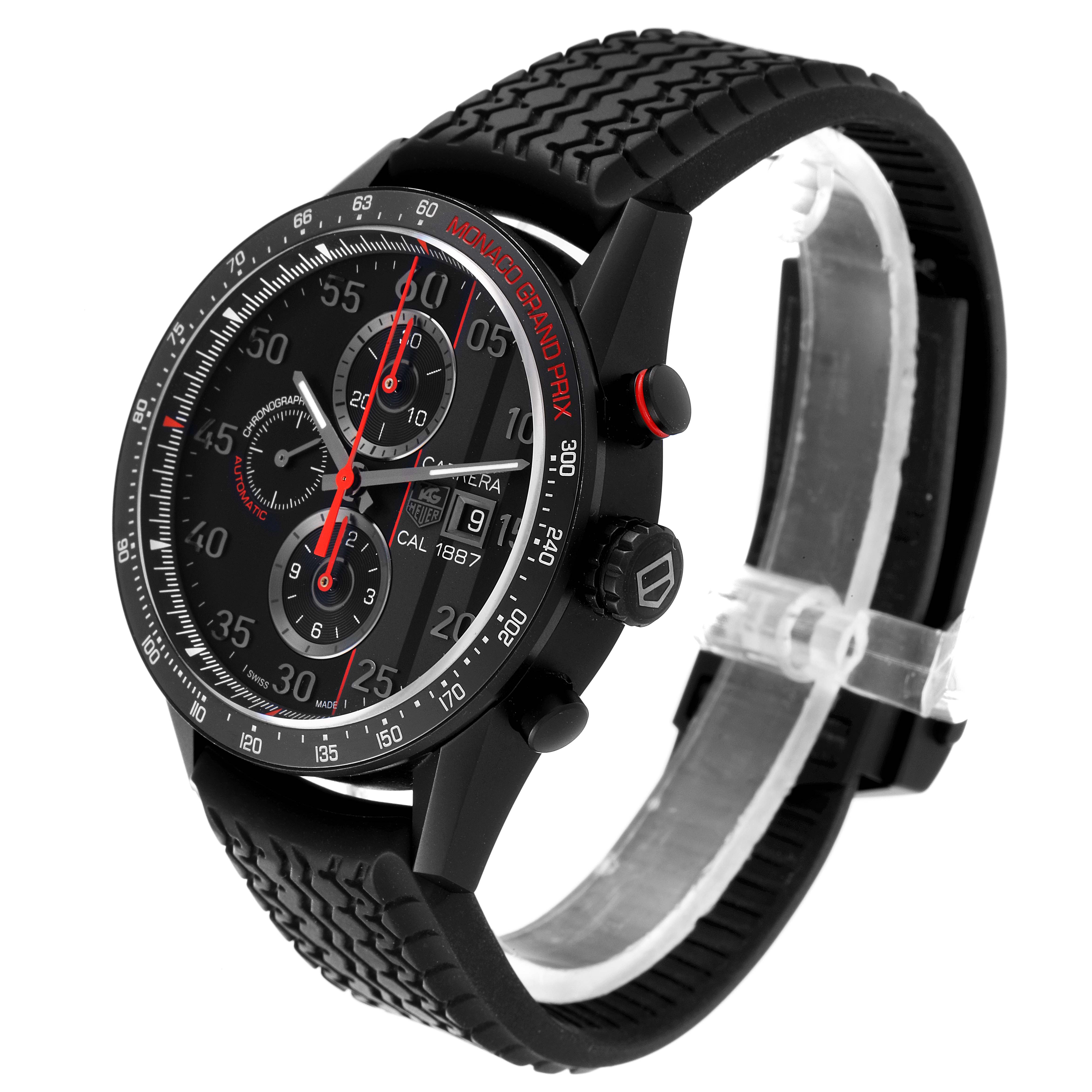 The Tag Heuer Monaco CAR2A83.FT6033 Men's Titanium Black Dial CAR2A83.FT6033 Men's Titanium Black Dial model is shown at a three-quarter angle, highlighting its black dial, rubber strap, and chronograph features.