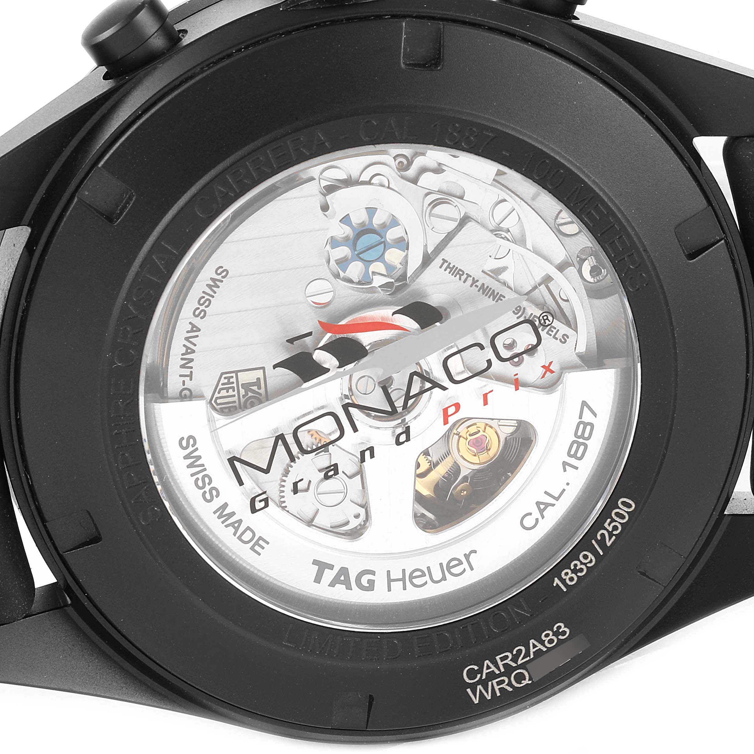 This image shows the back view of the Tag Heuer Monaco CAR2A83.FT6033 Men's Titanium Black Dial CAR2A83.FT6033 Men's Titanium Black Dial watch, highlighting its sapphire crystal case and intricate mechanism.
