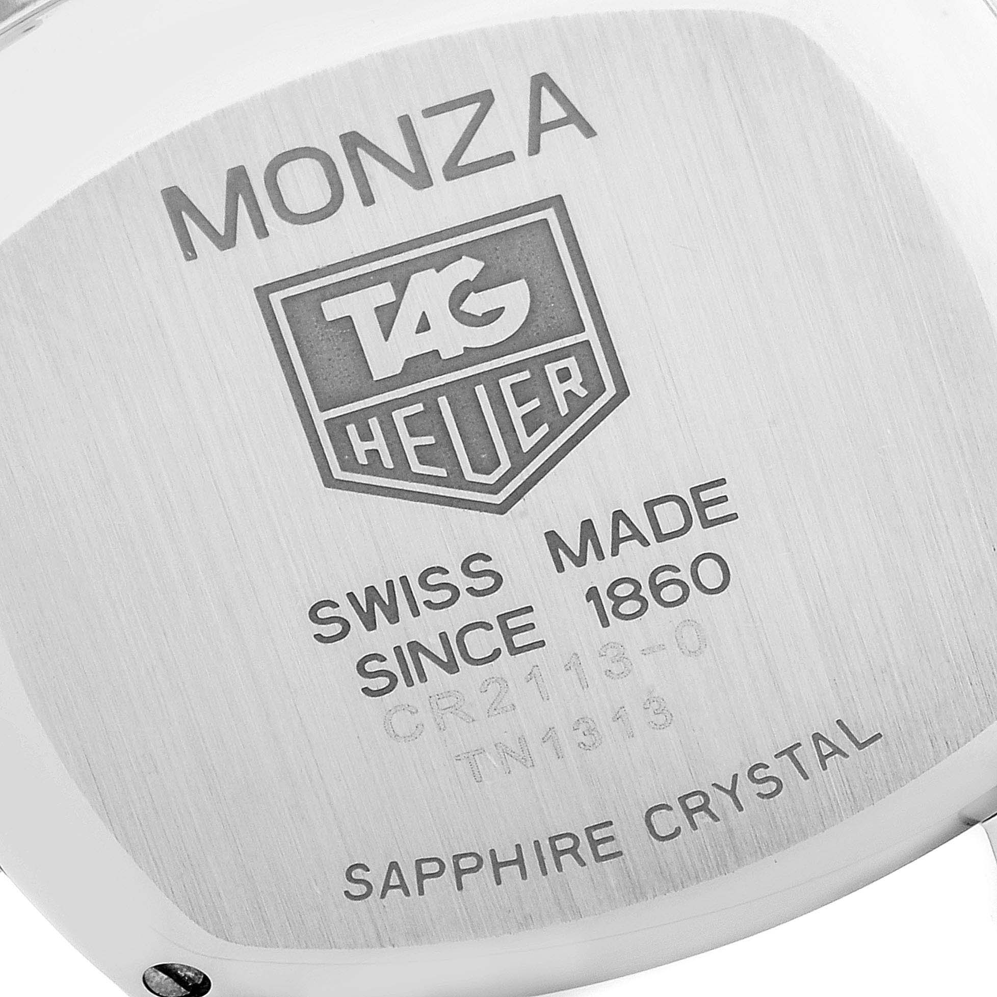 The image shows the case back of the Tag Heuer Monza CR2113.FC6164 Men's Stainless Steel Black Dial CR2113.FC6164 Men's Stainless Steel Black Dial watch, highlighting its branding and specifications.