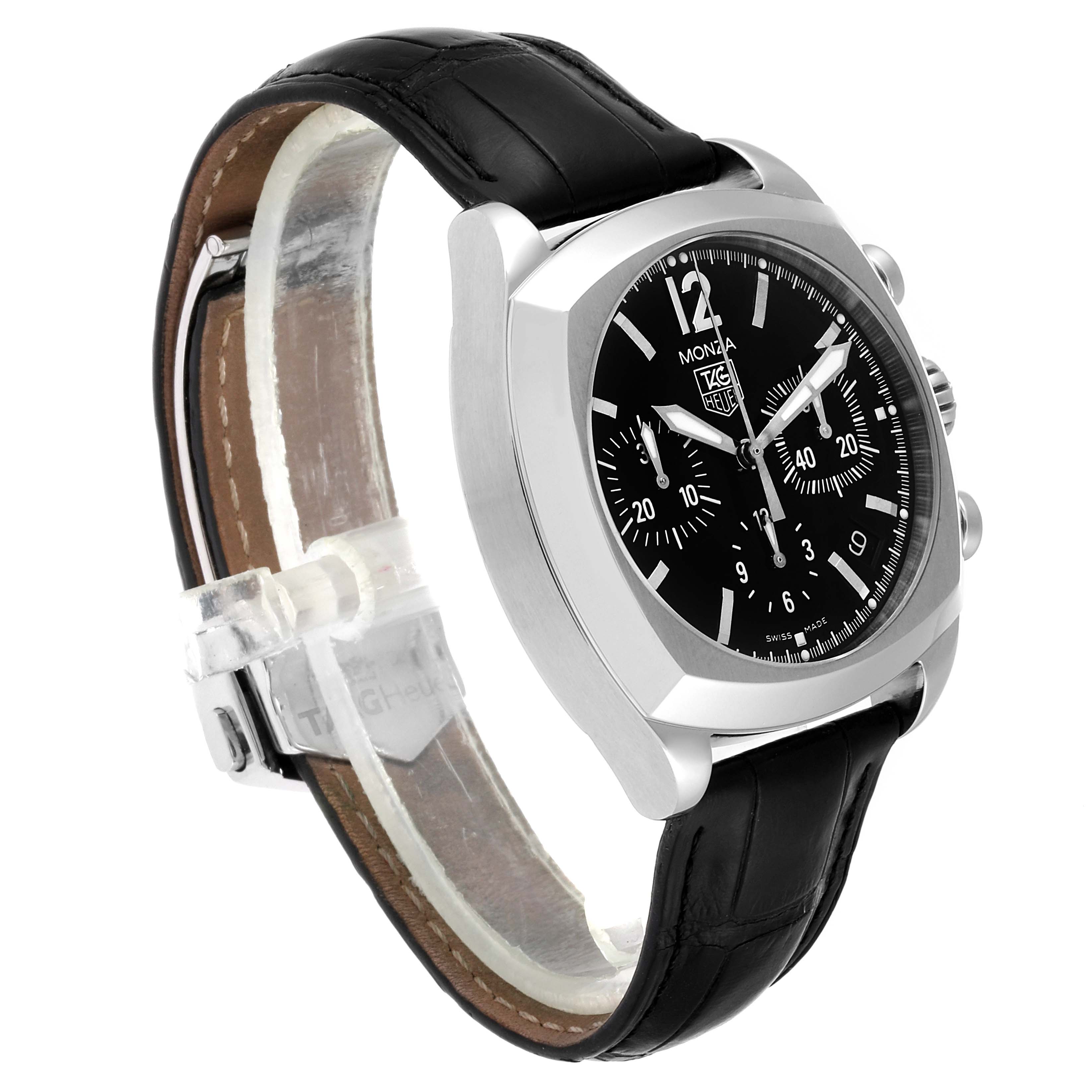 The image shows a Monza model Tag Heuer watch from a side angle, highlighting the face, case, and leather strap.