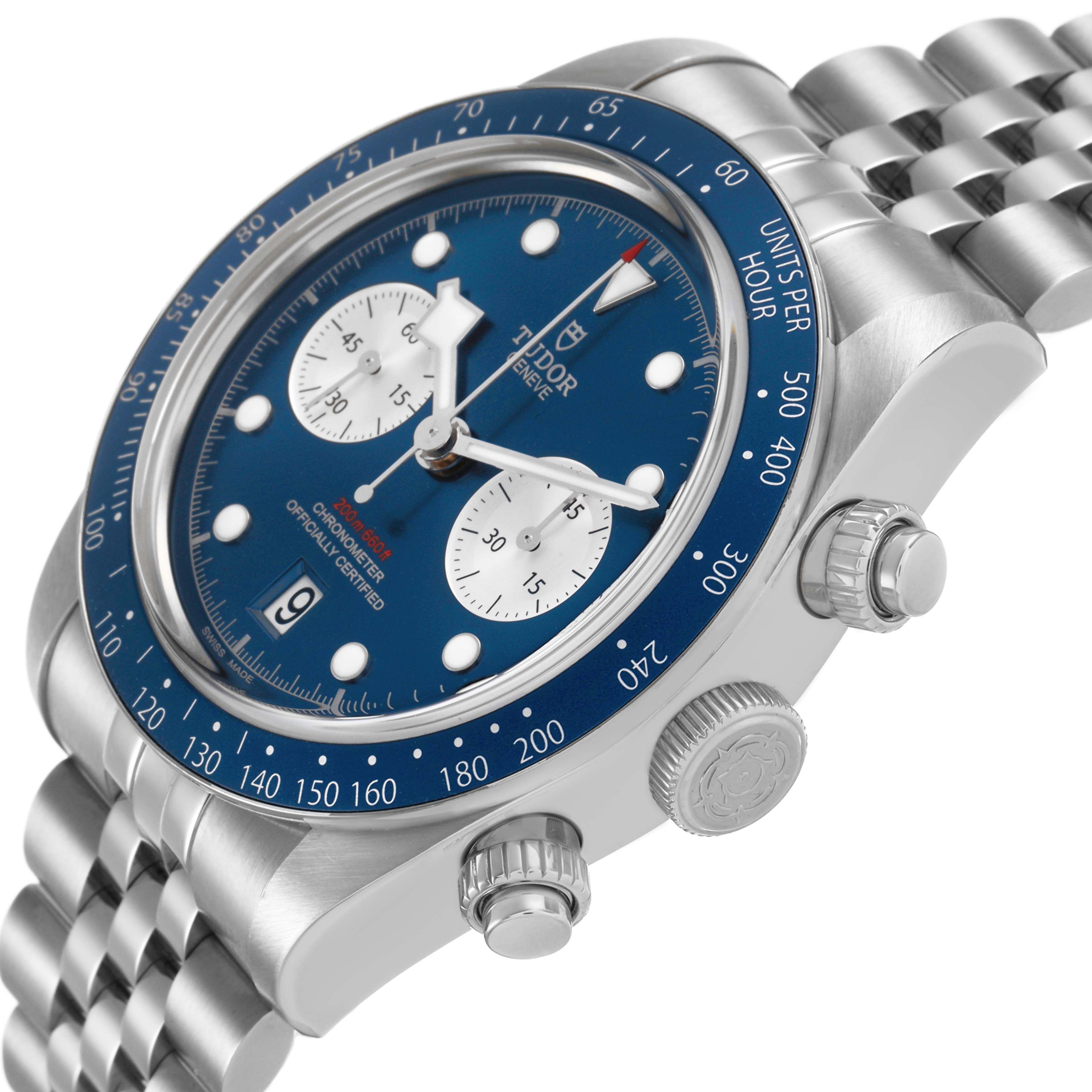 The Tudor Heritage Chrono 79360B Men's Stainless Steel Blue Dial watch is shown at a three-quarter angle, highlighting the dial, bezel, crown, and pushers.
