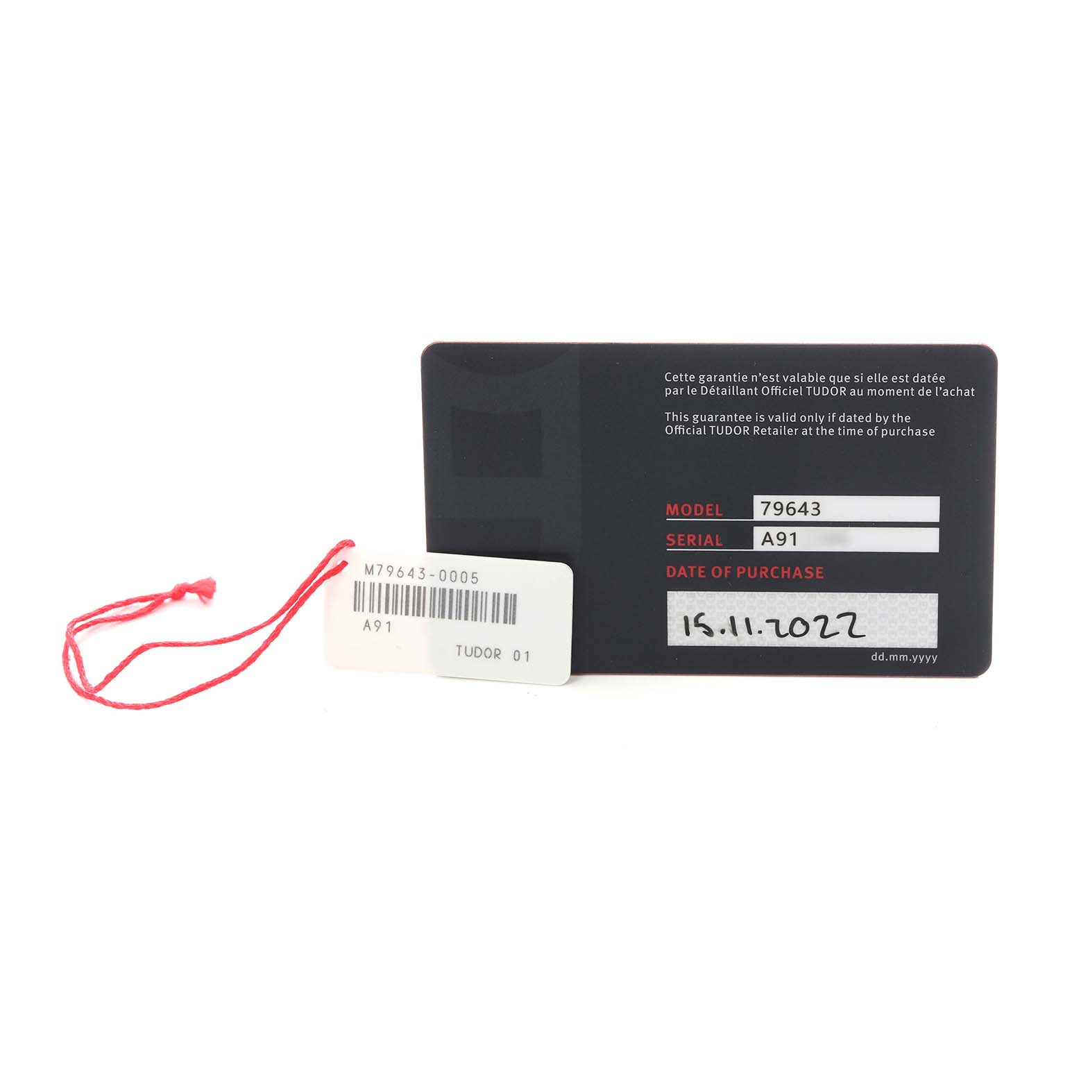 The image shows warranty and tag information for a Tudor Heritage Black Bay M79643-0005 Men
s Steel and Gold (two tone) Champagne Dial M79643-0005 Men
s Steel and Gold (two tone) Champagne Dial watch, with model, serial number, and purchase date.