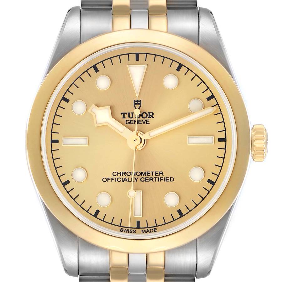 The Tudor Heritage Black Bay M79643-0005 Men's Steel and Gold (two tone) Champagne Dial watch is shown from a front angle, highlighting the dial, bezel, and part of the bracelet.