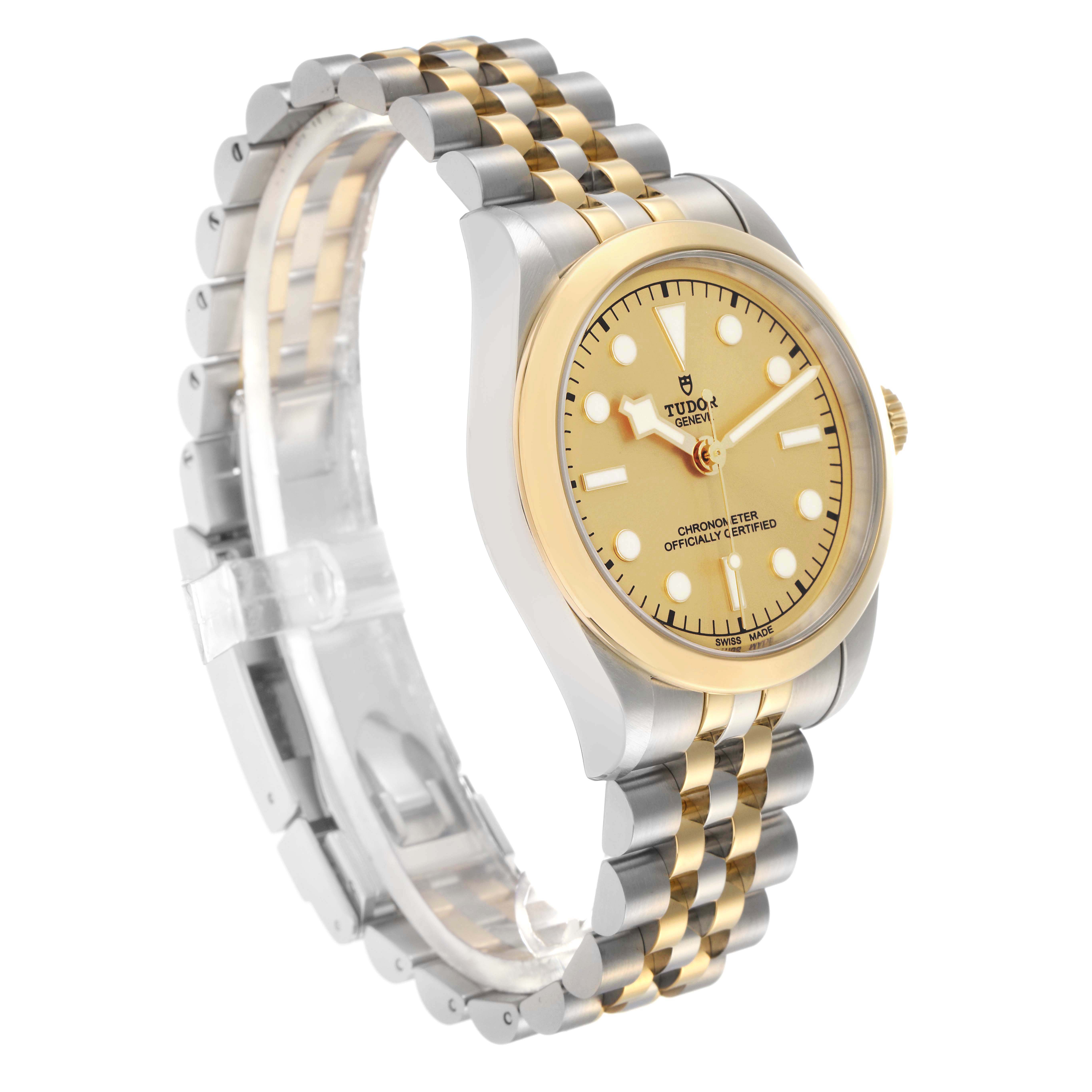 The Tudor Heritage Black Bay M79643-0005 Men
s Steel and Gold (two tone) Champagne Dial watch is shown at an angled side view, displaying the face, bezel, and bracelet.