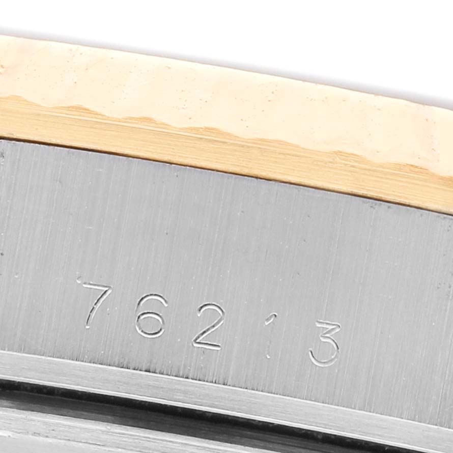 The image shows a close-up of the engraved case back edge of the Tudor Prince 76213 Men's Stainless Steel Champagne Dial model, displaying the model number "76213."