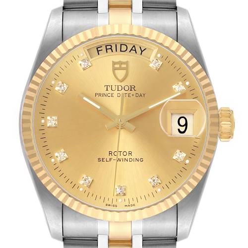The Tudor Prince 76213 Men's Stainless Steel Champagne Dial model watch is shown from the front, highlighting its gold dial, date, day display, and fluted bezel.