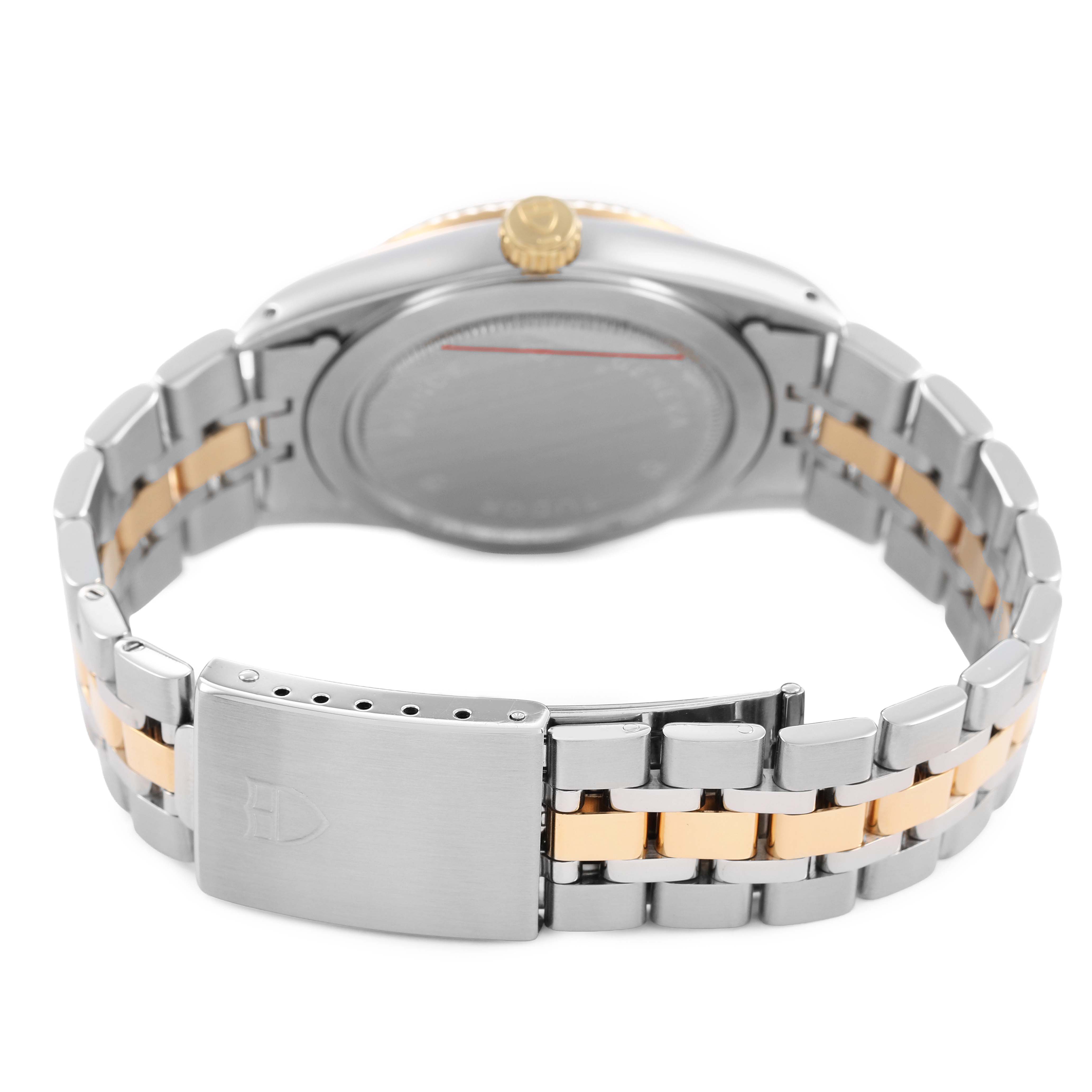 The image shows a Tudor Prince 76213 Men's Stainless Steel Champagne Dial watch from a back angle, highlighting the stainless steel and gold-toned bracelet and clasp.