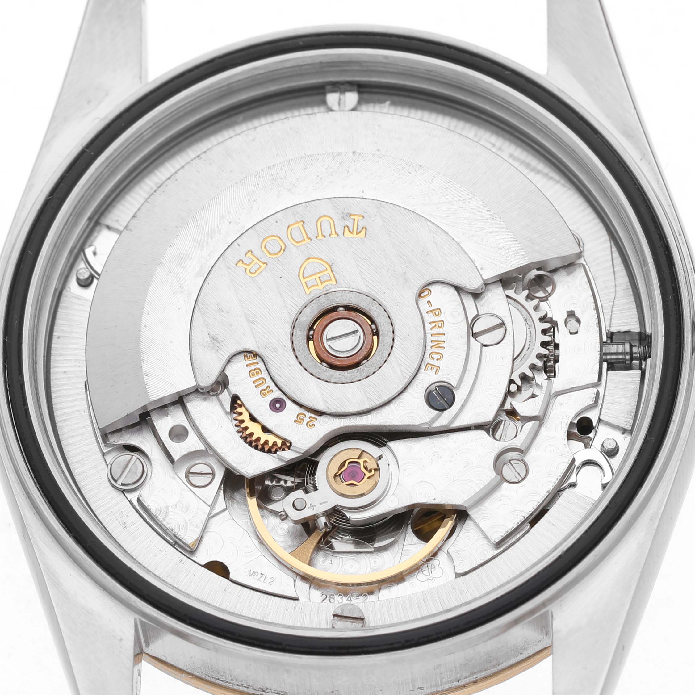 The image shows the movement mechanism of a Tudor Prince 76213 Men's Stainless Steel Champagne Dial watch from a rear angle.