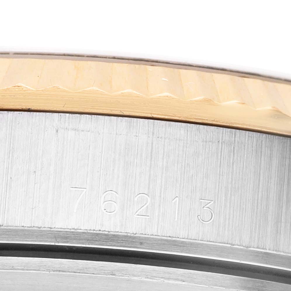 The image shows a close-up of the engraved side and bezel of a Tudor Prince 76213 Men's Stainless Steel Champagne Dial watch model 76213.