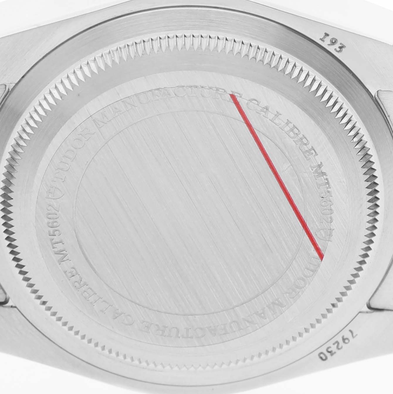 The image shows the case back of the Tudor Heritage Black Bay 79230R Men's Stainless Steel Black Dial watch from a straight-on angle.