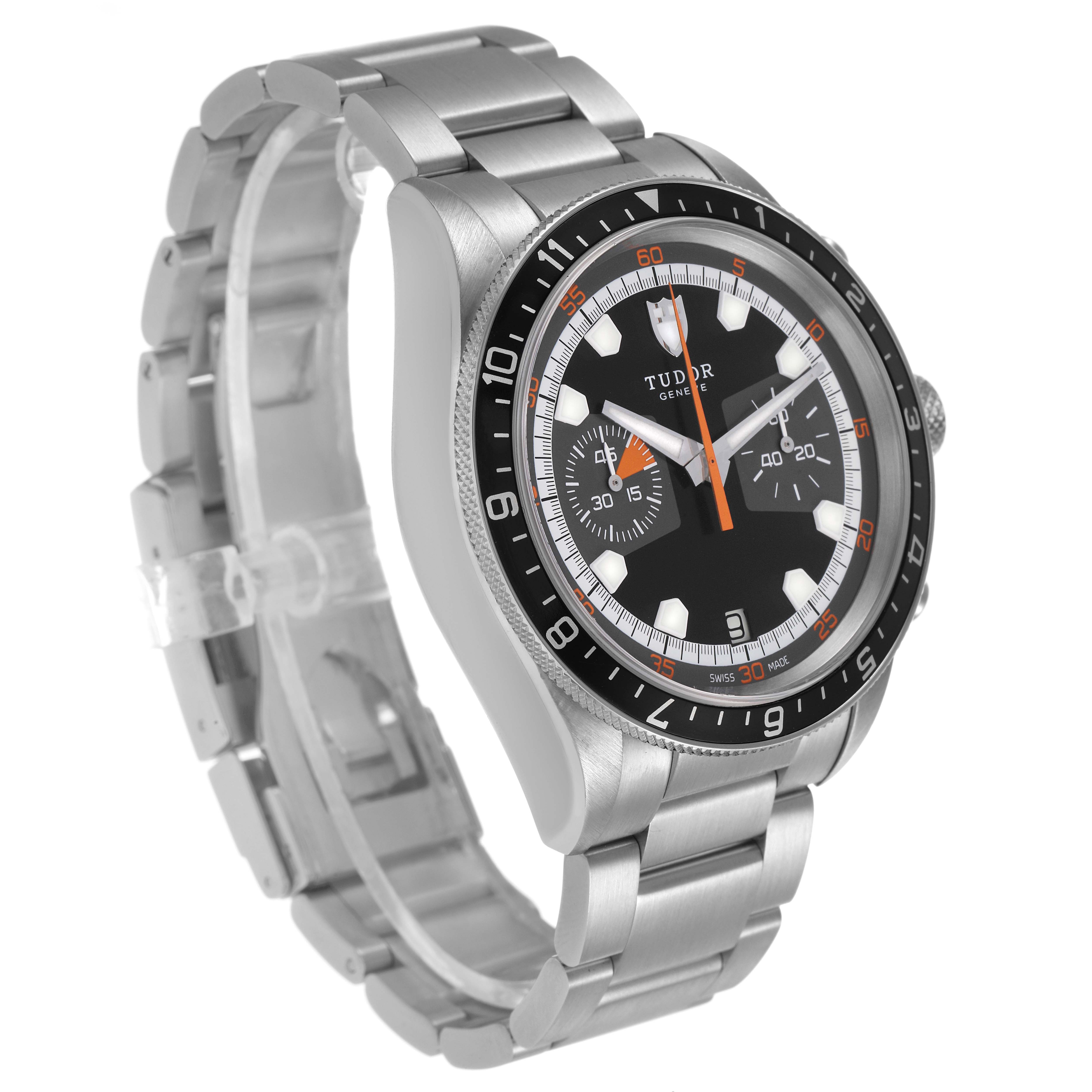 The Tudor Heritage Chrono 70330N Men's Stainless Steel Black Dial watch is shown at a three-quarter angle, highlighting the case, dial, and bracelet.