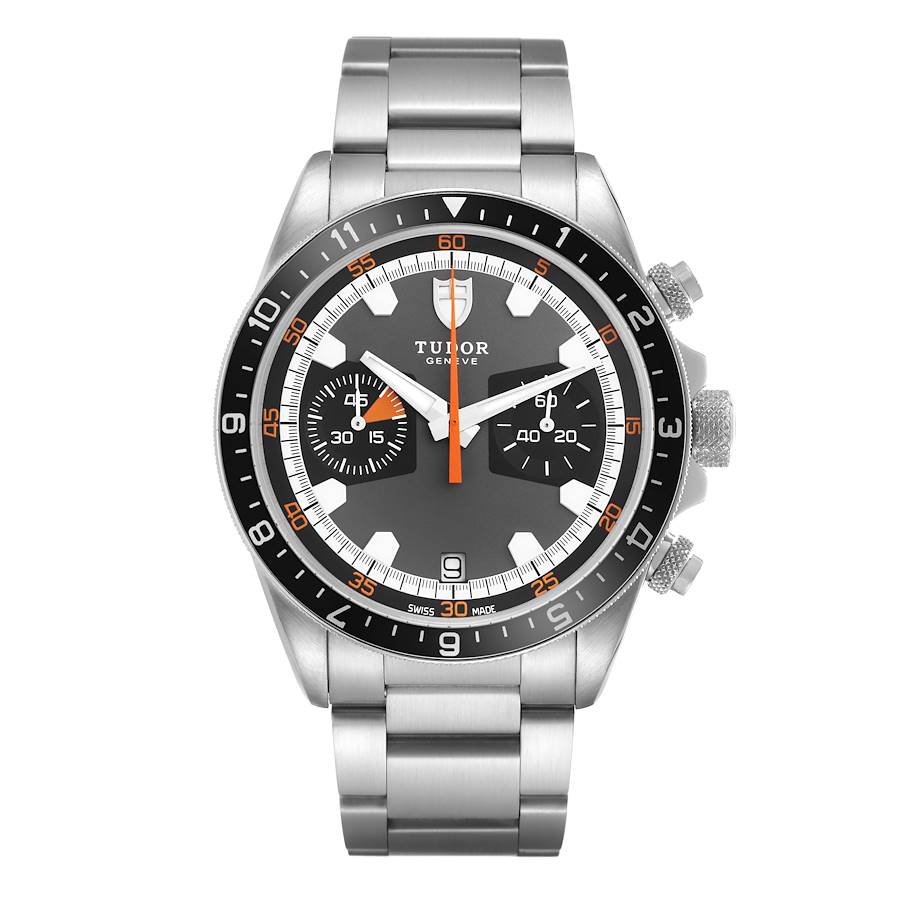 The Tudor Heritage Chrono watch is shown from the front, displaying the dial, bezel, crown, pushers, and bracelet.