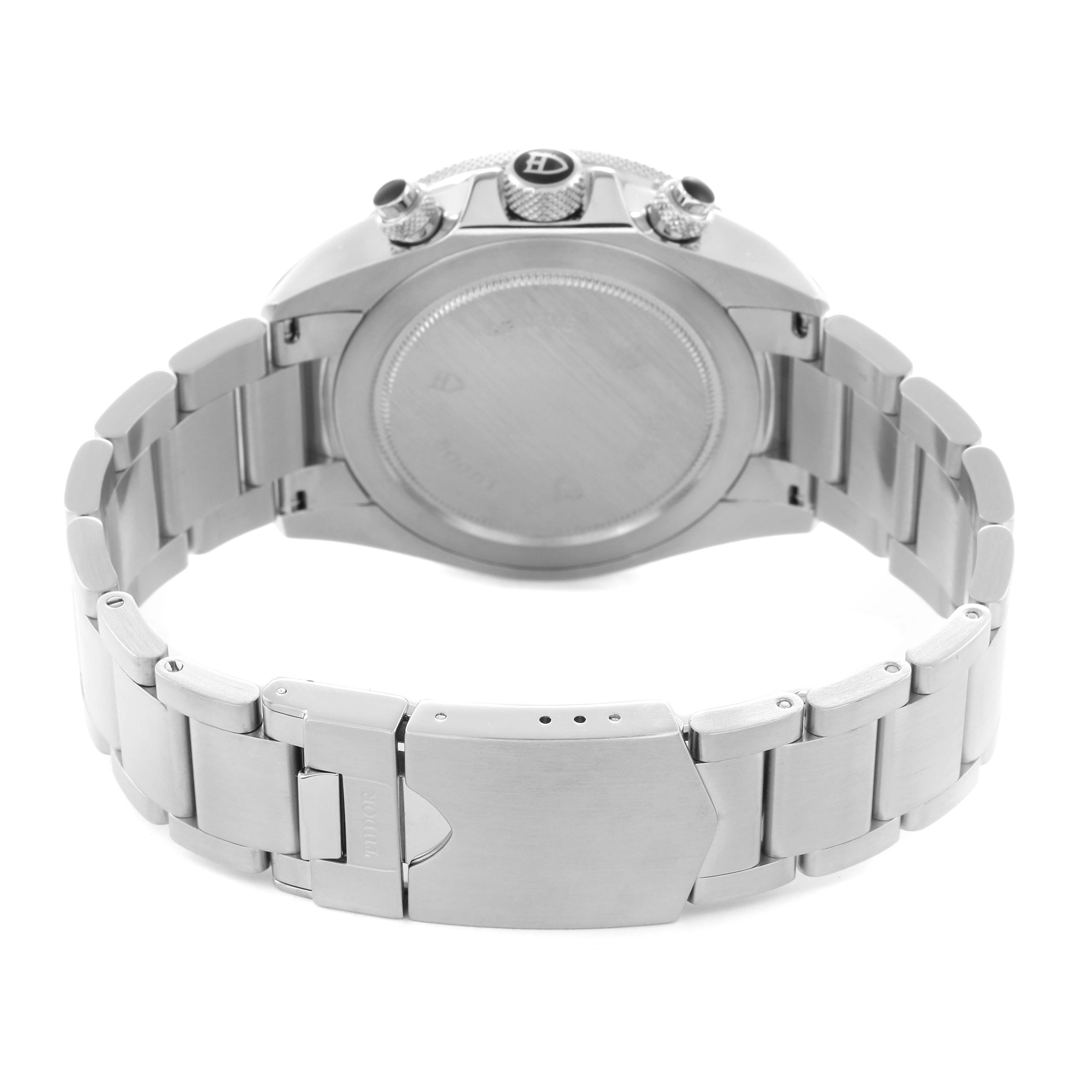 The image shows the back of the Tudor Heritage Chrono 70330N-65740 Men
s Stainless Steel Grey Dial 70330N-65740 Men
s Stainless Steel Grey Dial watch, highlighting the case back, crown, pushers, and bracelet.