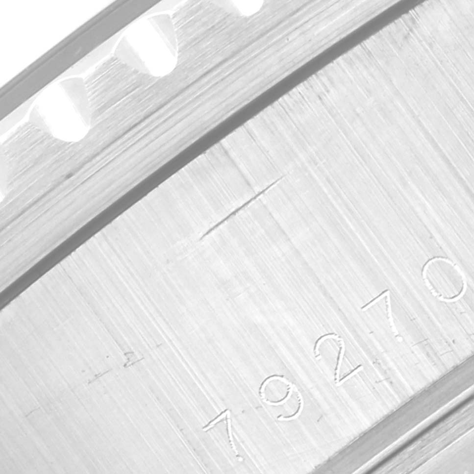 Close-up of the case side of the Tudor Prince 79270 Men's Stainless Steel Black Dial 79270 Men's Stainless Steel Black Dial model, showing the serial number engraving.