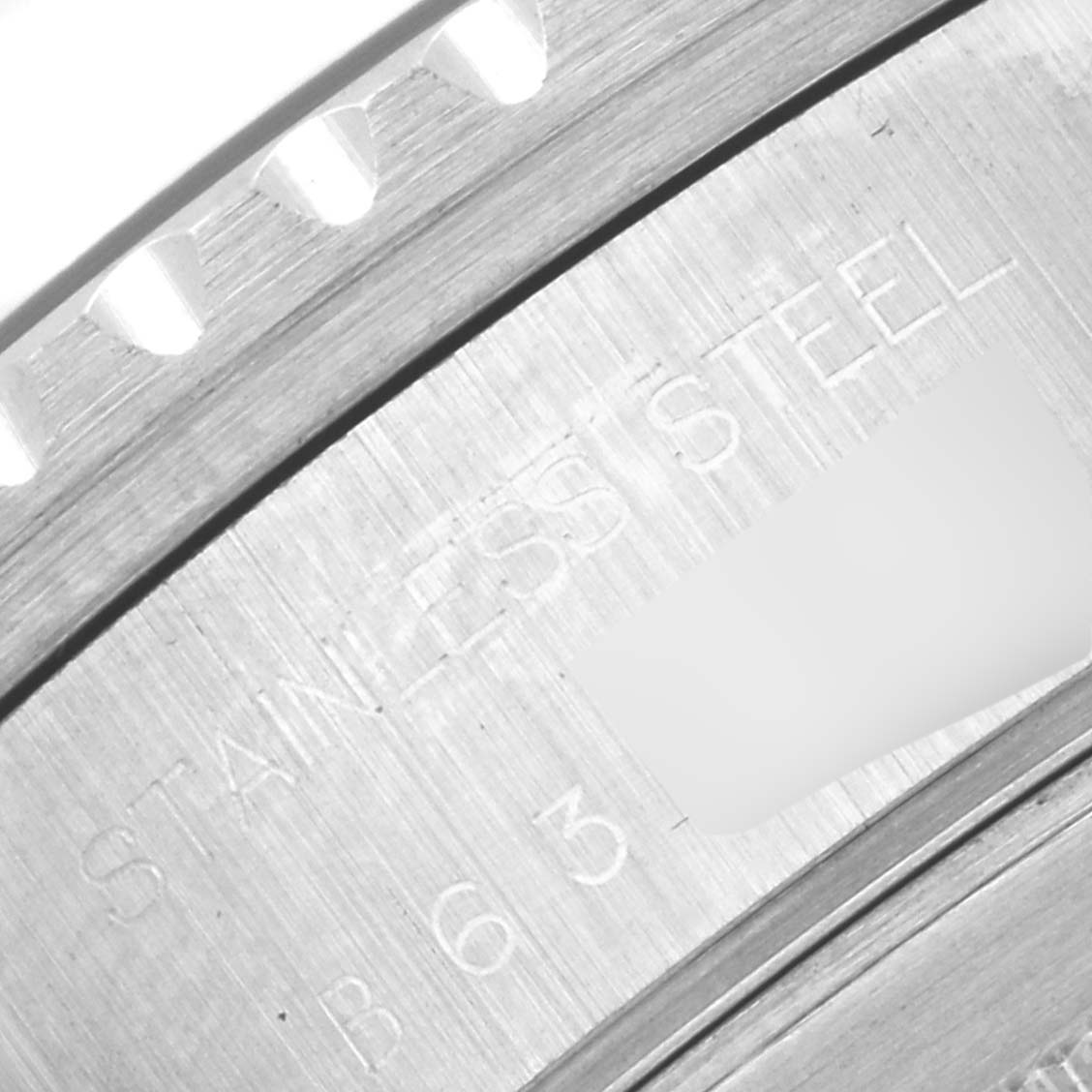 This image shows a close-up of the engraved case back of a Tudor Prince 79270 Men's Stainless Steel Black Dial 79270 Men's Stainless Steel Black Dial model watch, highlighting the "STAINLESS STEEL" text.