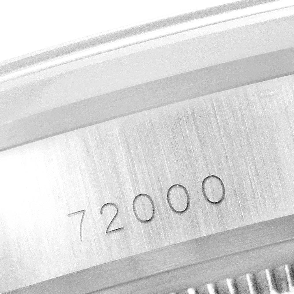 This close-up image shows the engraved serial number on the case back of the Tudor Prince 72000 Men's Stainless Steel Black Dial 72000 Men's Stainless Steel Black Dial model watch.