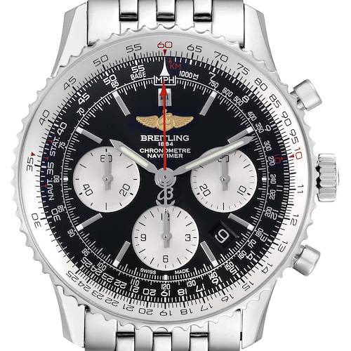 The image shows a Breitling Navitimer watch face, including the bezel, crown, sub-dials, and lugs, photographed from the front.