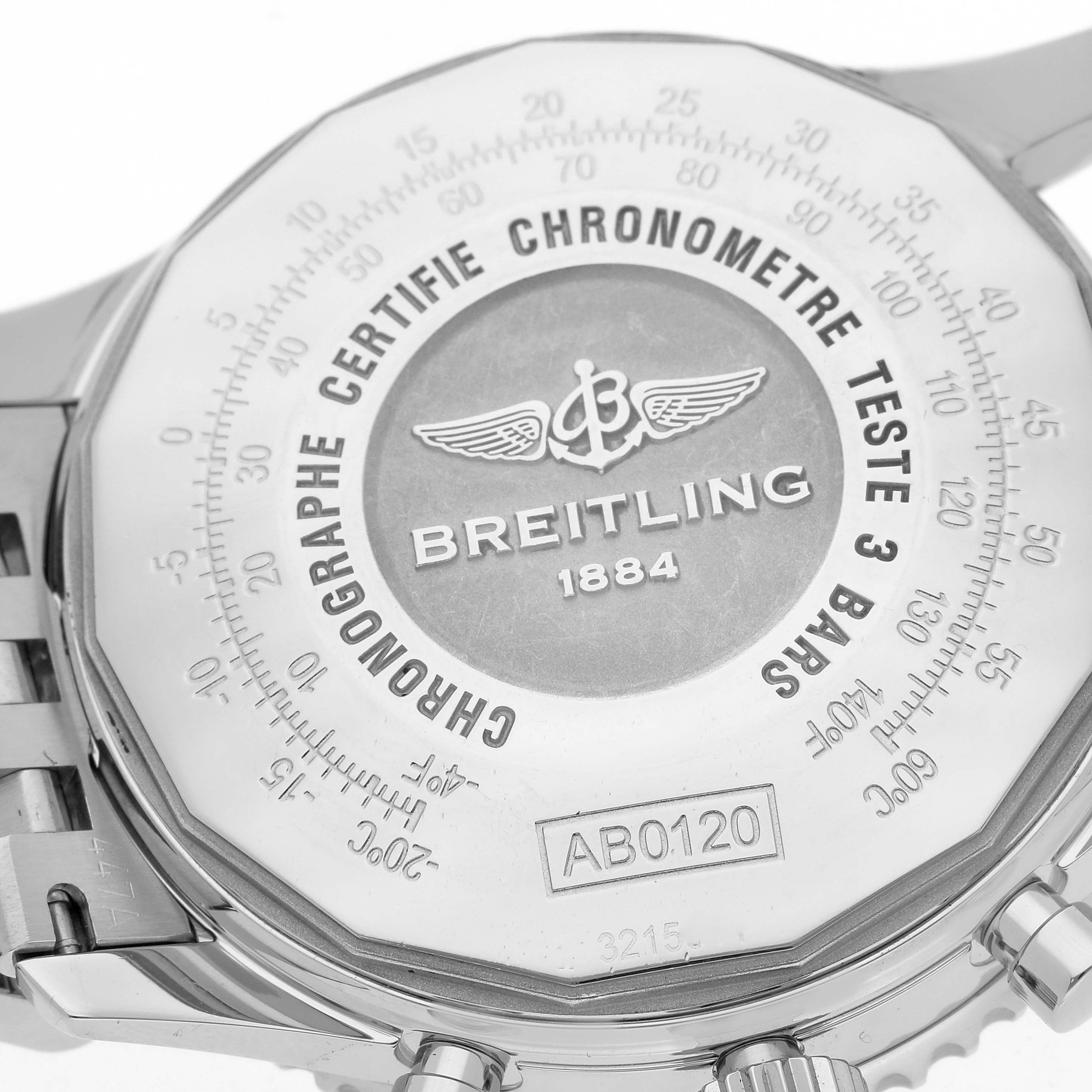 The image shows the back of the Breitling Navitimer AB0120 Men
s Stainless Steel Black Dial AB0120 Men
s Stainless Steel Black Dial watch, featuring its detailed engravings and metal bracelet.