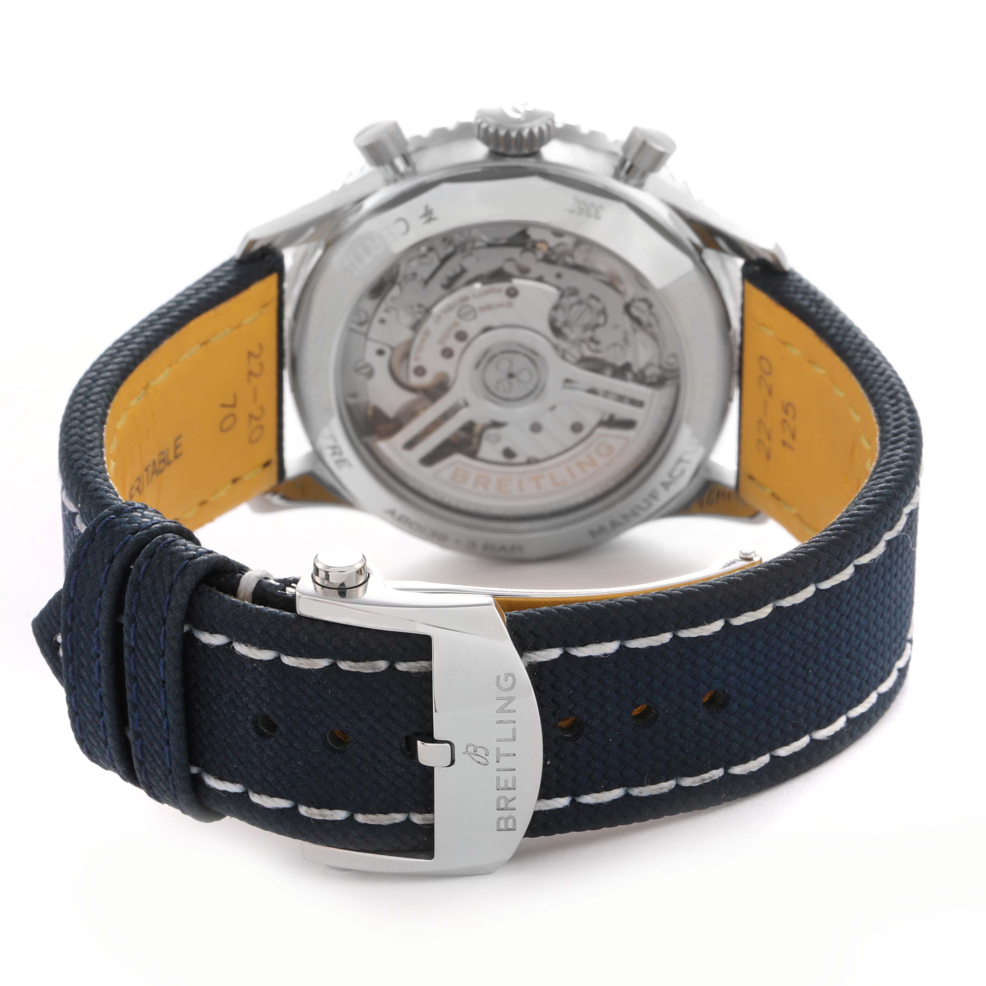 The image shows a Breitling Navitimer AB0139241C1P1 men
s watch from the back, highlighting the open case back and buckle with branding.