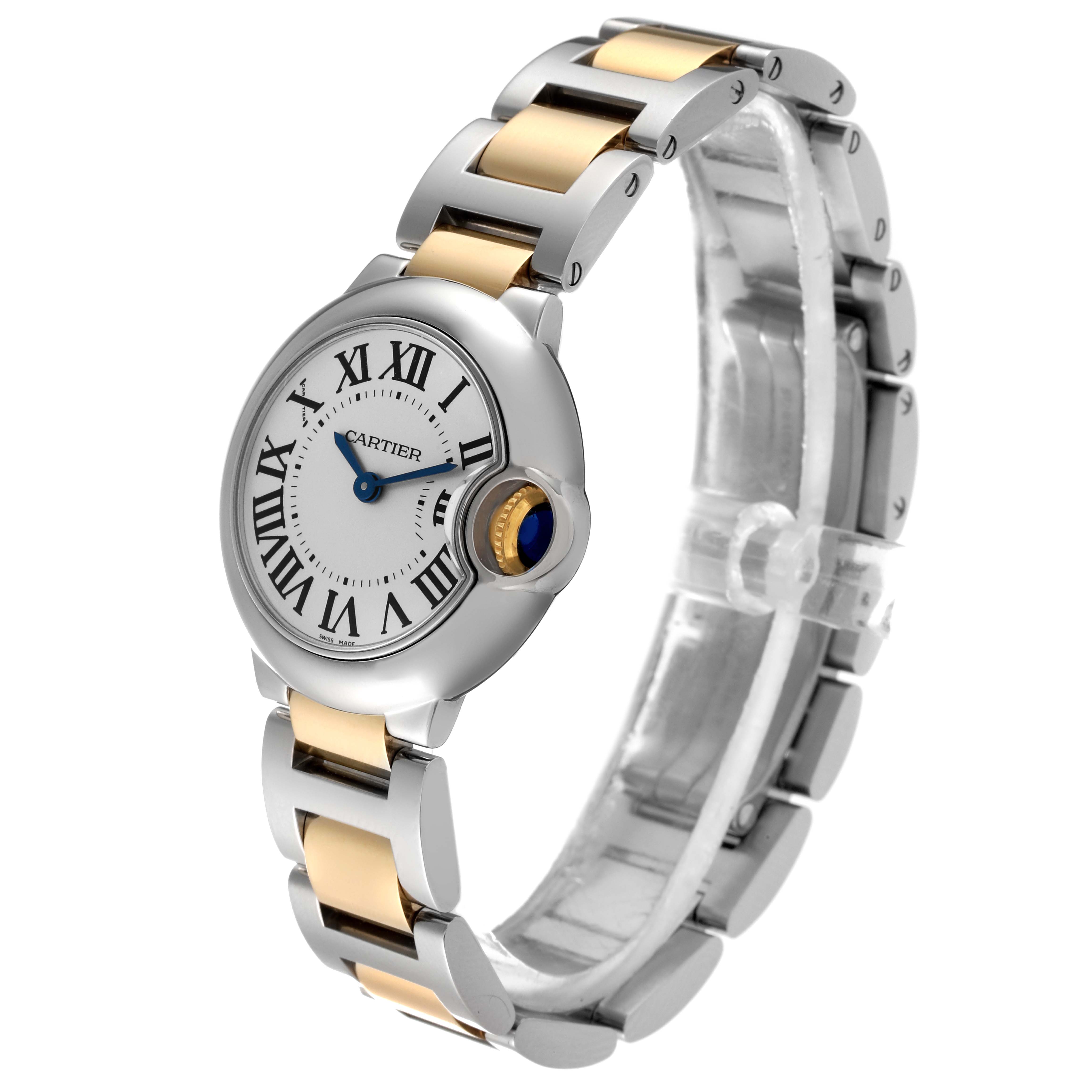The image shows a Cartier Ballon Bleu W69007Z3 Women
s Steel and Gold (two tone) Silver Dial W69007Z3 Women
s Steel and Gold (two tone) Silver Dial watch at a three-quarter angle, highlighting its dial, crown, and two-tone metal bracelet.