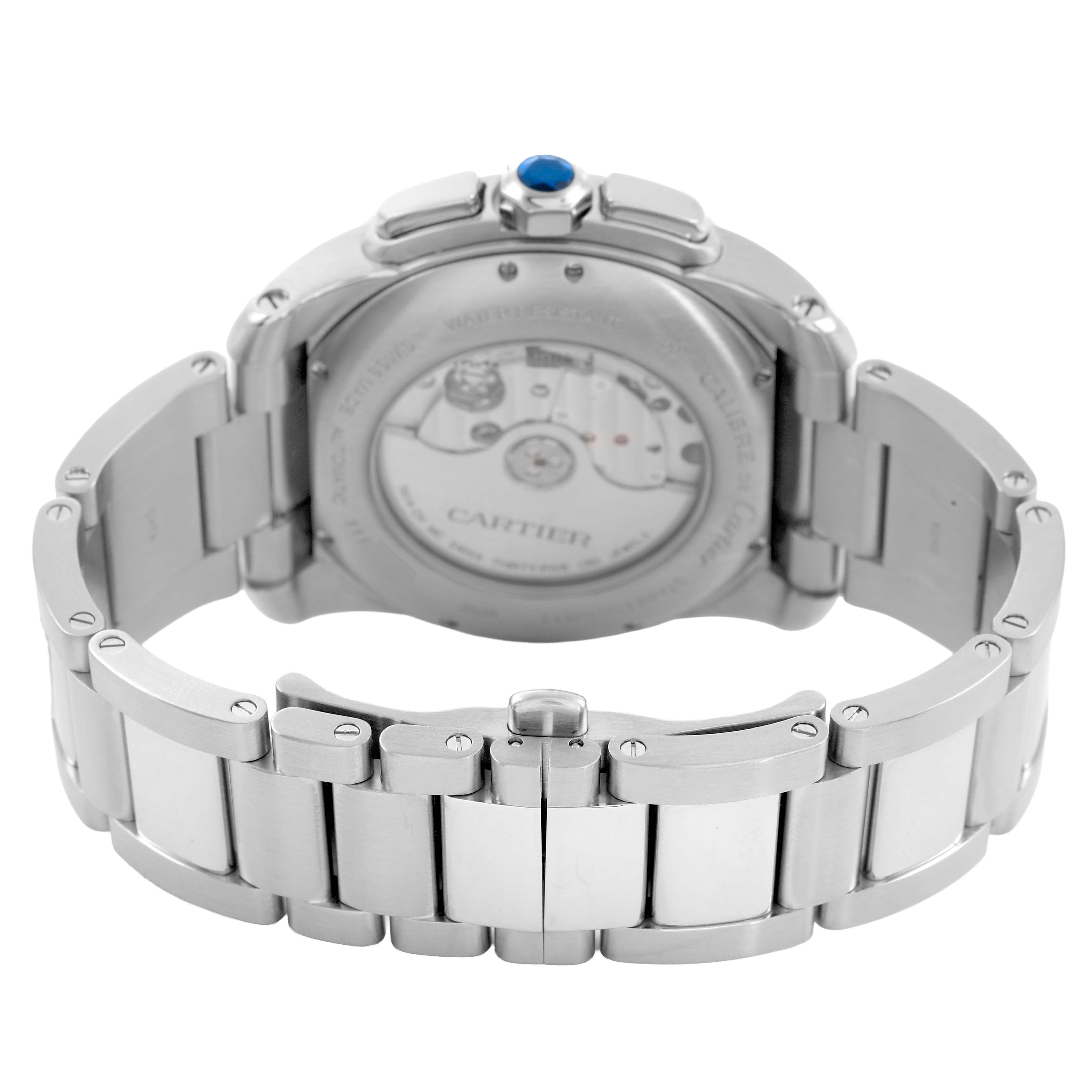 The image shows the back of a Calibre de Cartier watch, highlighting the bracelet and case back with visible movement.