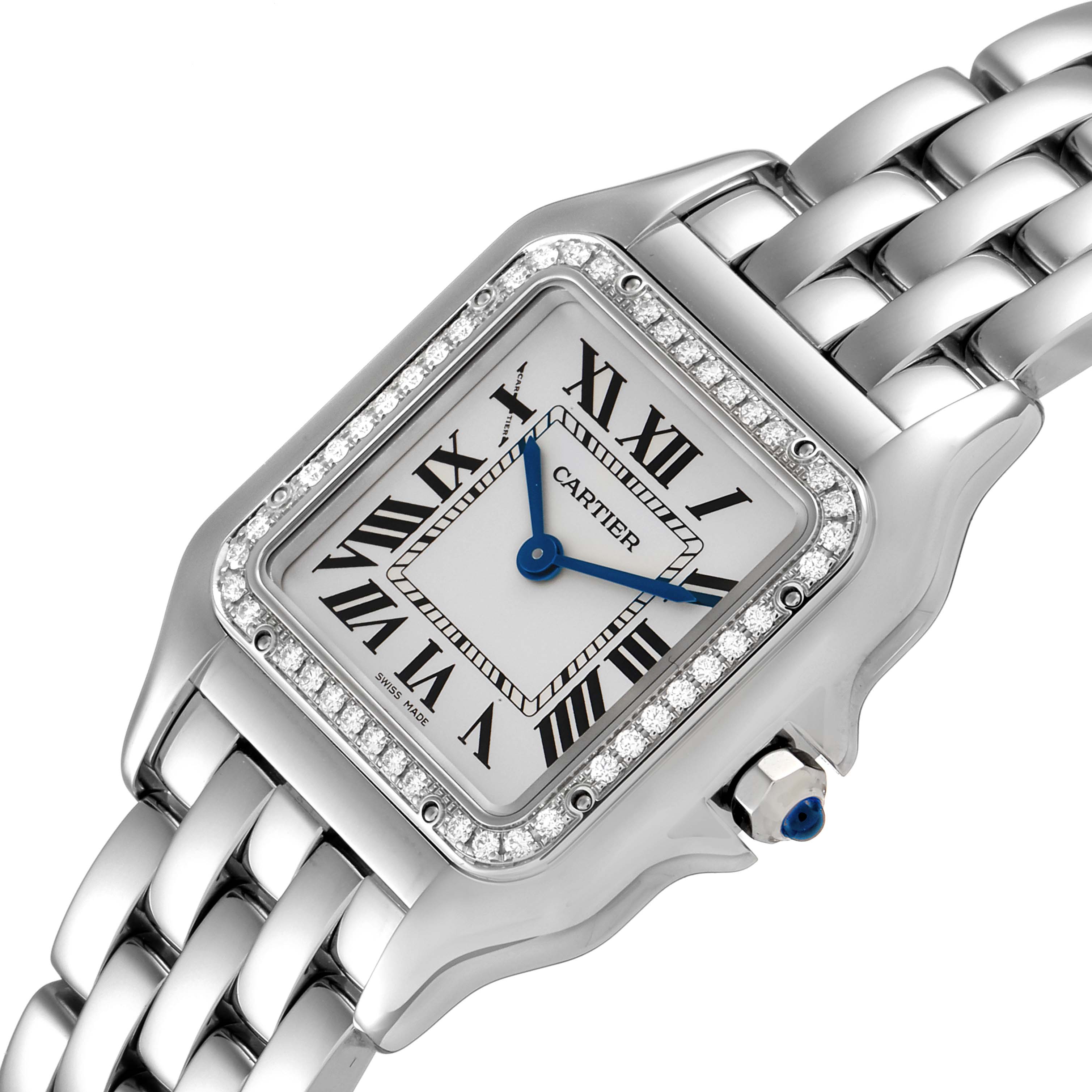 The image shows a close-up of the Cartier Panthere W4PN0008 Women
s Stainless Steel Silver Dial W4PN0008 Women
s Stainless Steel Silver Dial watch, highlighting its dial, bezel, and part of its bracelet from a top-down angle.