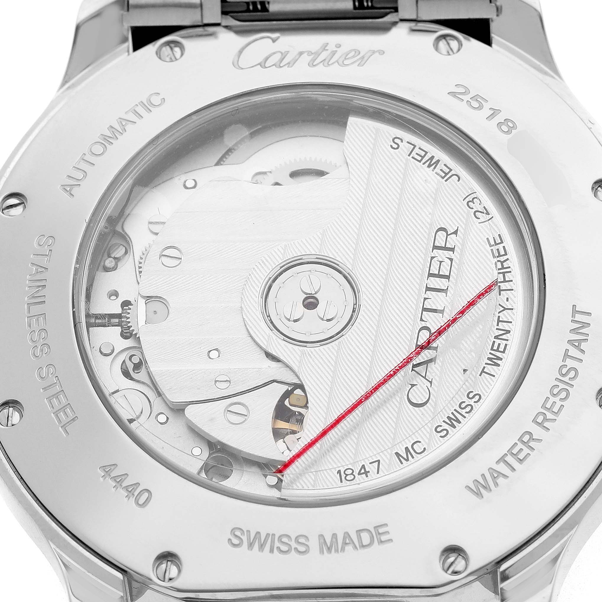 The image shows the case back of a Cartier Ronde WSRN0035 Men's Stainless Steel Silver Dial model, highlighting its movement and engravings.