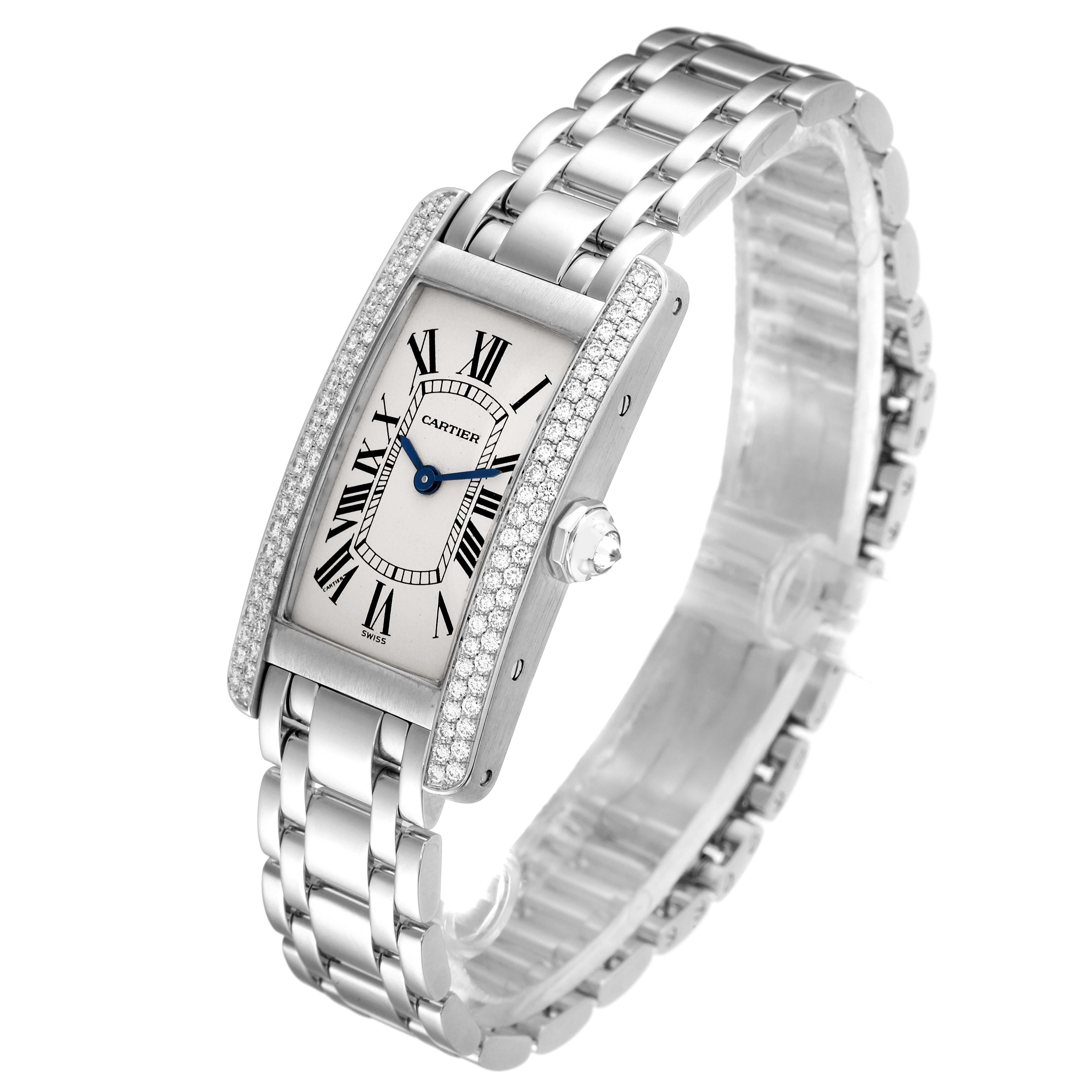 The image shows a Cartier Tank Américaine watch, angled to display its face, bezel, crown, and bracelet.