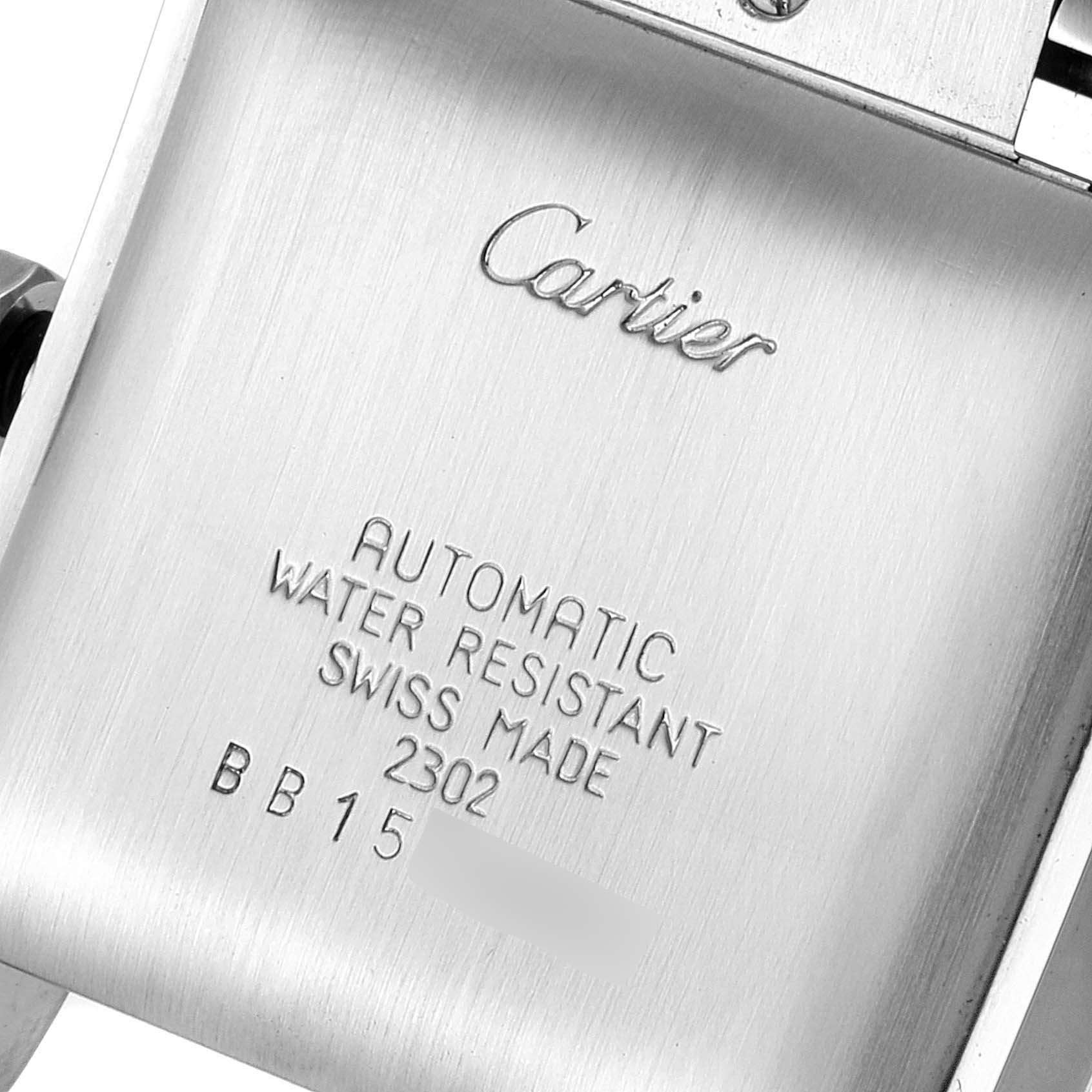 This image shows the back case of a Cartier Tank Francaise W51002Q3 Men's Stainless Steel Silver Dial W51002Q3 Men's Stainless Steel Silver Dial watch, highlighting its engraved details.