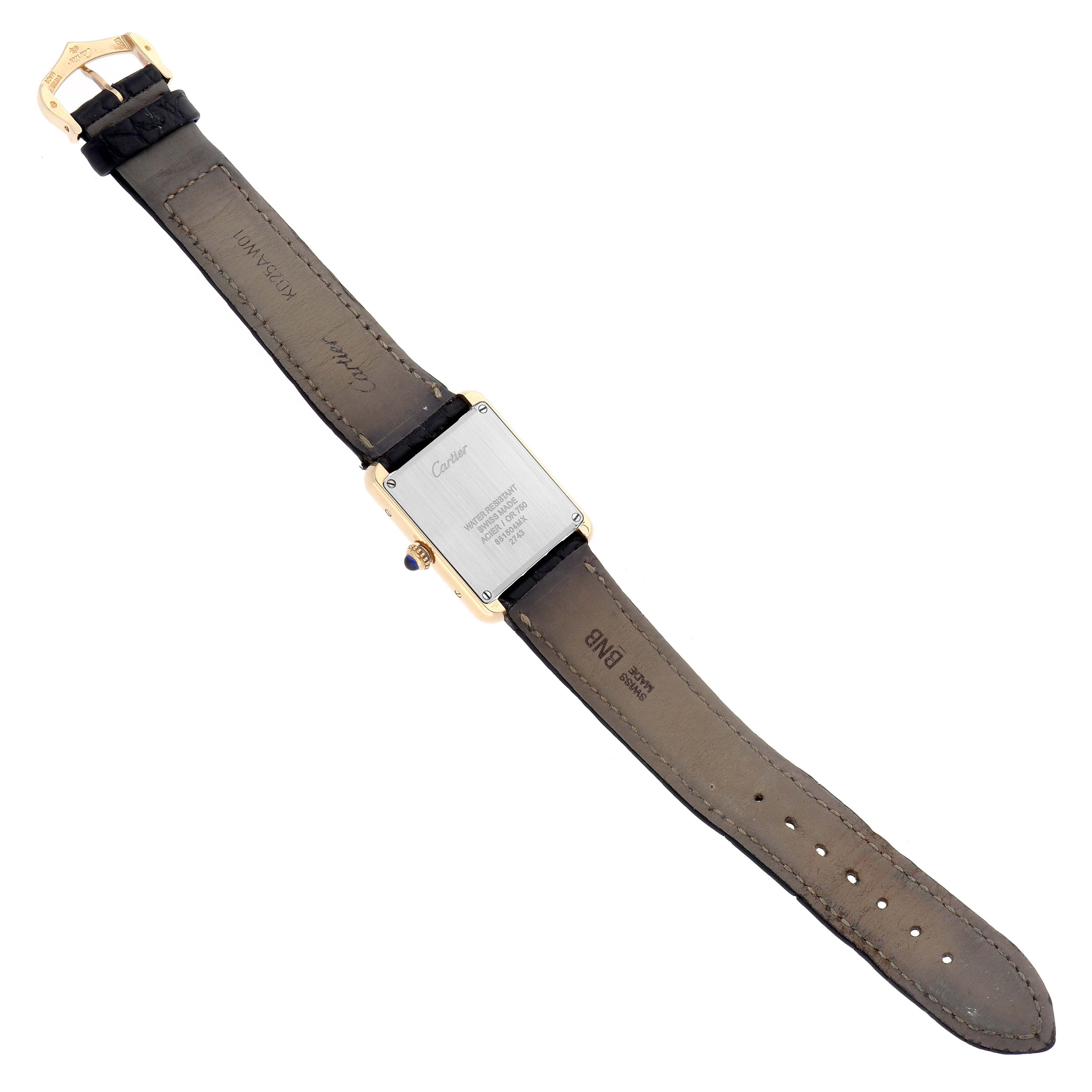 The image shows the back view of a Cartier Tank Solo watch, model W1018755, displaying the case back, strap, and buckle.