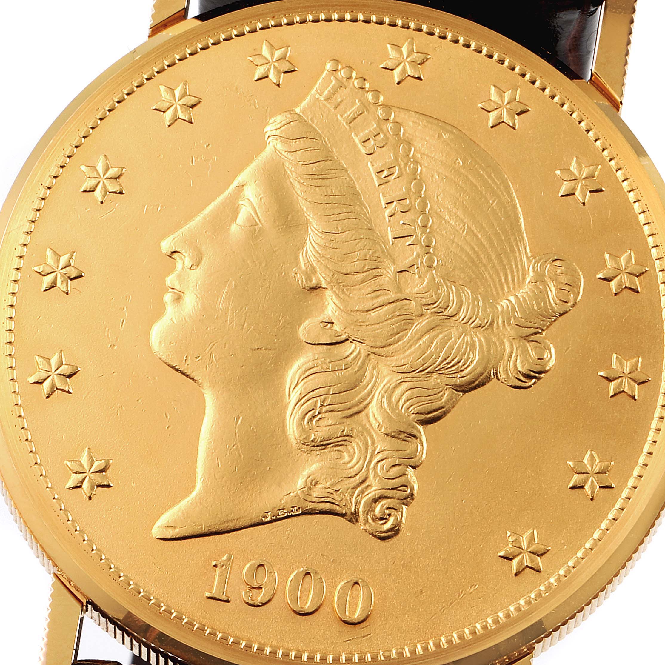 The image shows a close-up of the Coin Watch model by Corum, highlighting the coin face and limited parts of the watch case and strap.