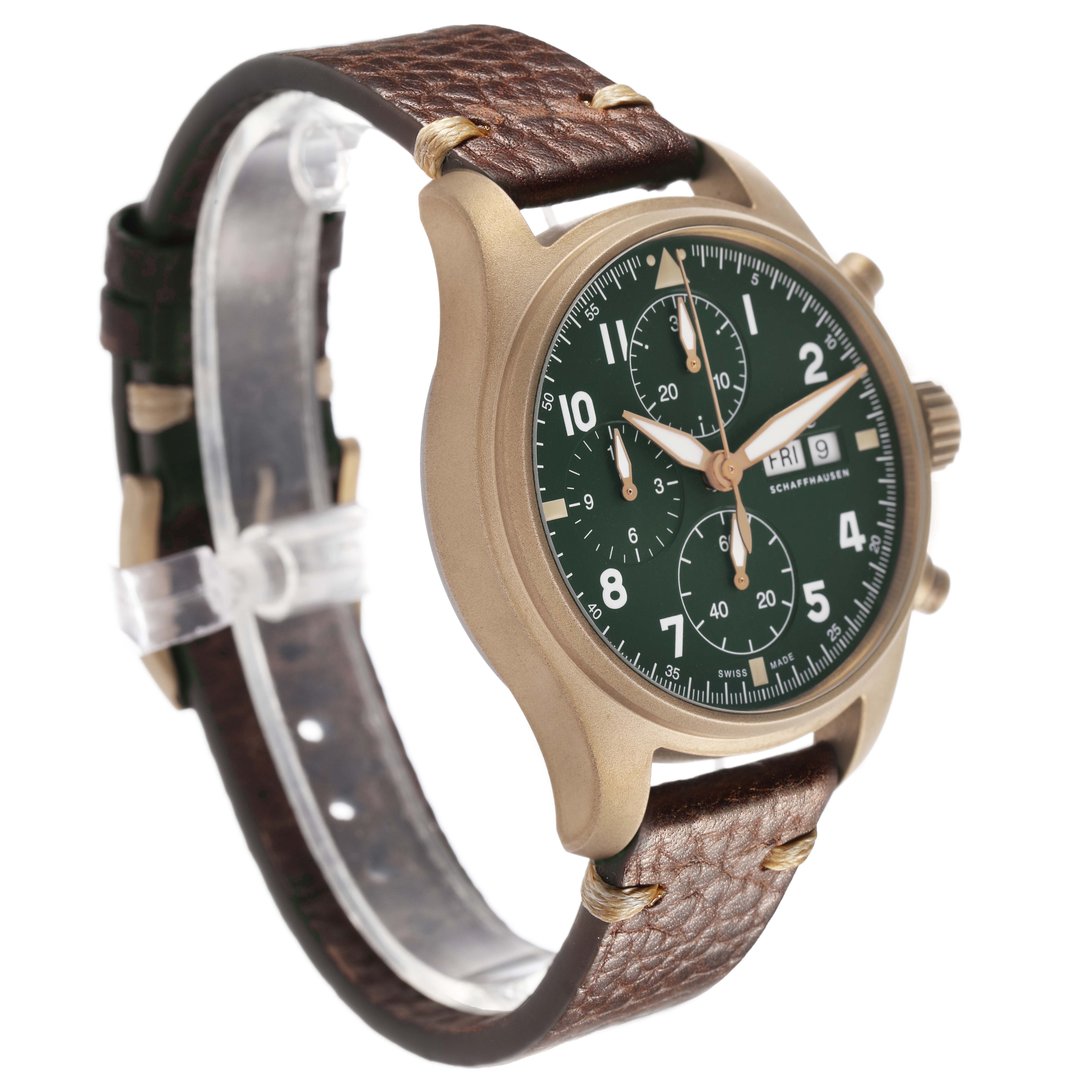 The IWC Pilot IW387902 Men's Bronze Green Dial watch is shown at a slight angle, highlighting the green dial, chronograph features, and brown leather strap.