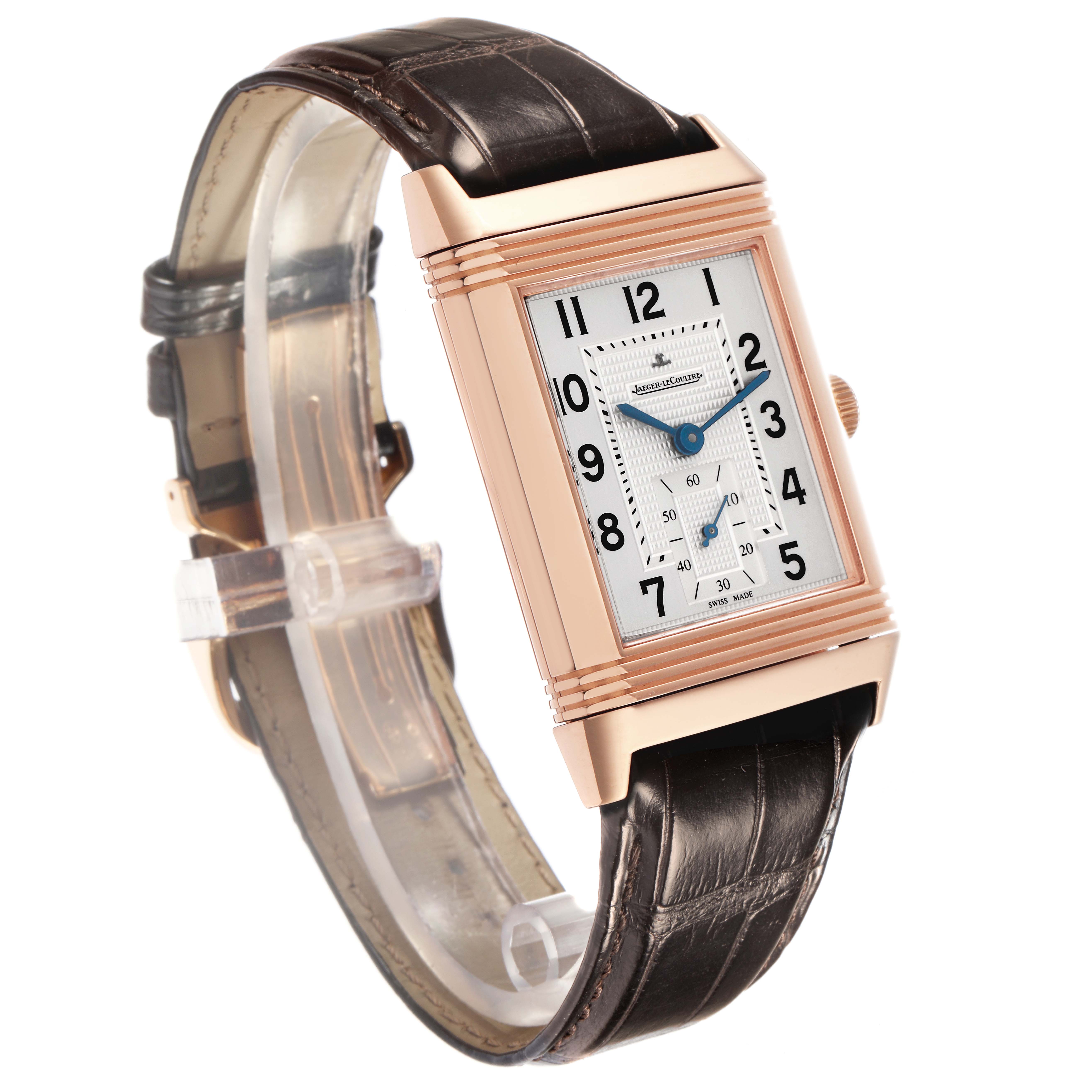 The Jaeger LeCoultre Reverso Q3732420 watch is shown at an angle highlighting the rectangular case, face details, crown, and leather strap.