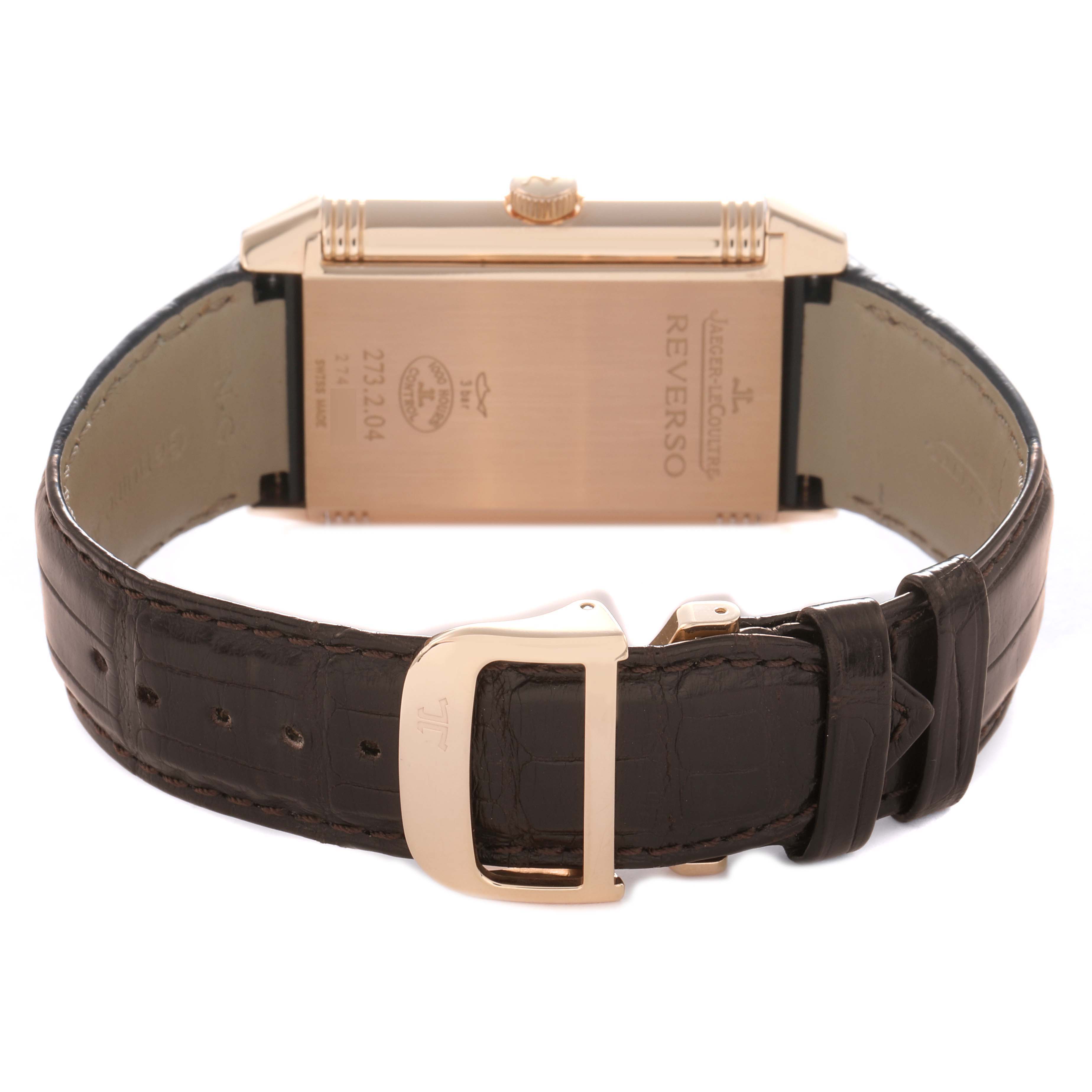 The image shows the back of a Jaeger LeCoultre Reverso model (Q3732420) men
s watch, highlighting the case back and brown leather strap with a gold buckle.
