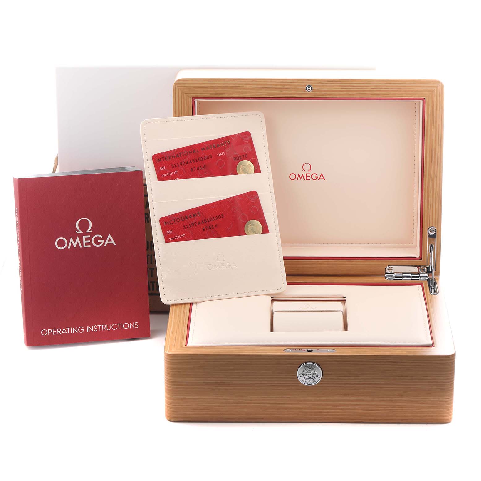 The image shows an Omega Speedmaster 311.92.44.51.01.003 Men's Ceramic Black Dial watch box set, with instructions, warranty cards, and the open wooden box.