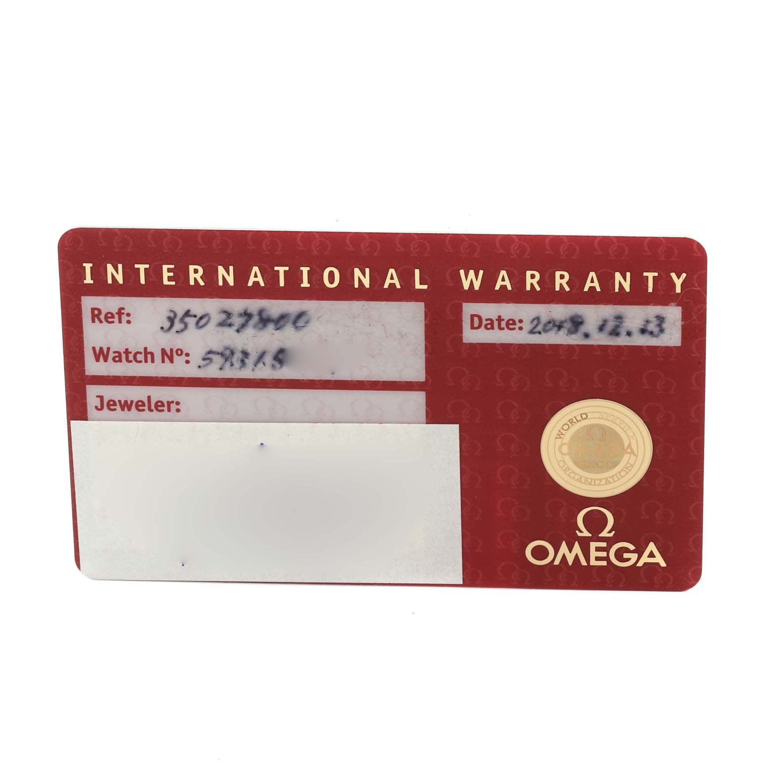 This image shows an Omega Speedmaster 3502.78.00 Men's Stainless Steel Mother of Pearl Dial 3502.78.00 Men's Stainless Steel Mother of Pearl Dial International Warranty card from a top view.