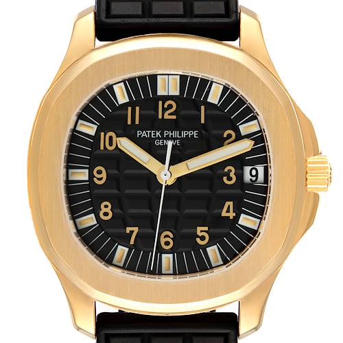 The image shows a front view of the Patek Philippe Aquanaut watch, highlighting its black dial, gold case, and date display.