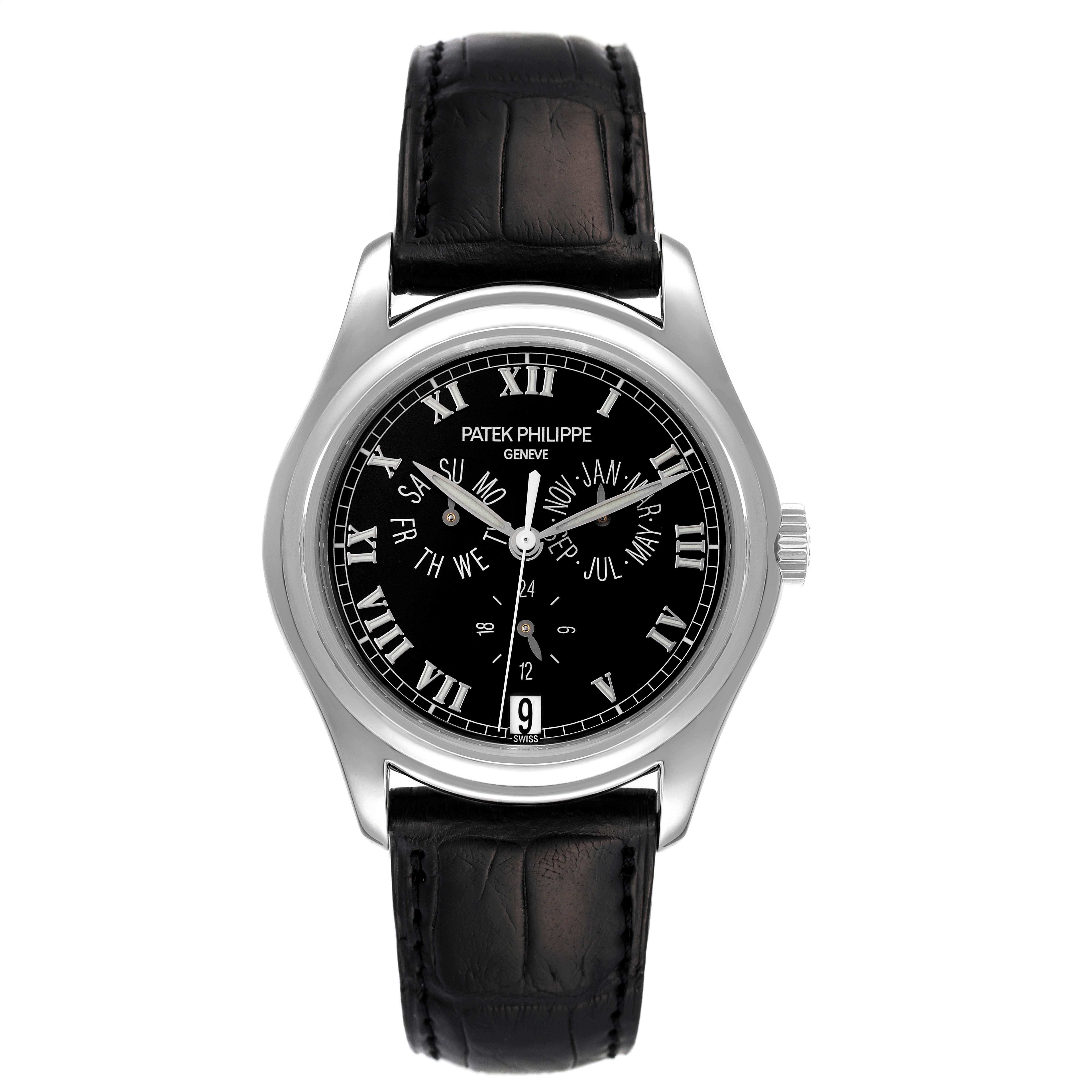 The image shows a front view of a Patek Philippe Complications 5035P Men's Platinum Black Dial 5035P Men's Platinum Black Dial watch with a black leather strap and a black dial.