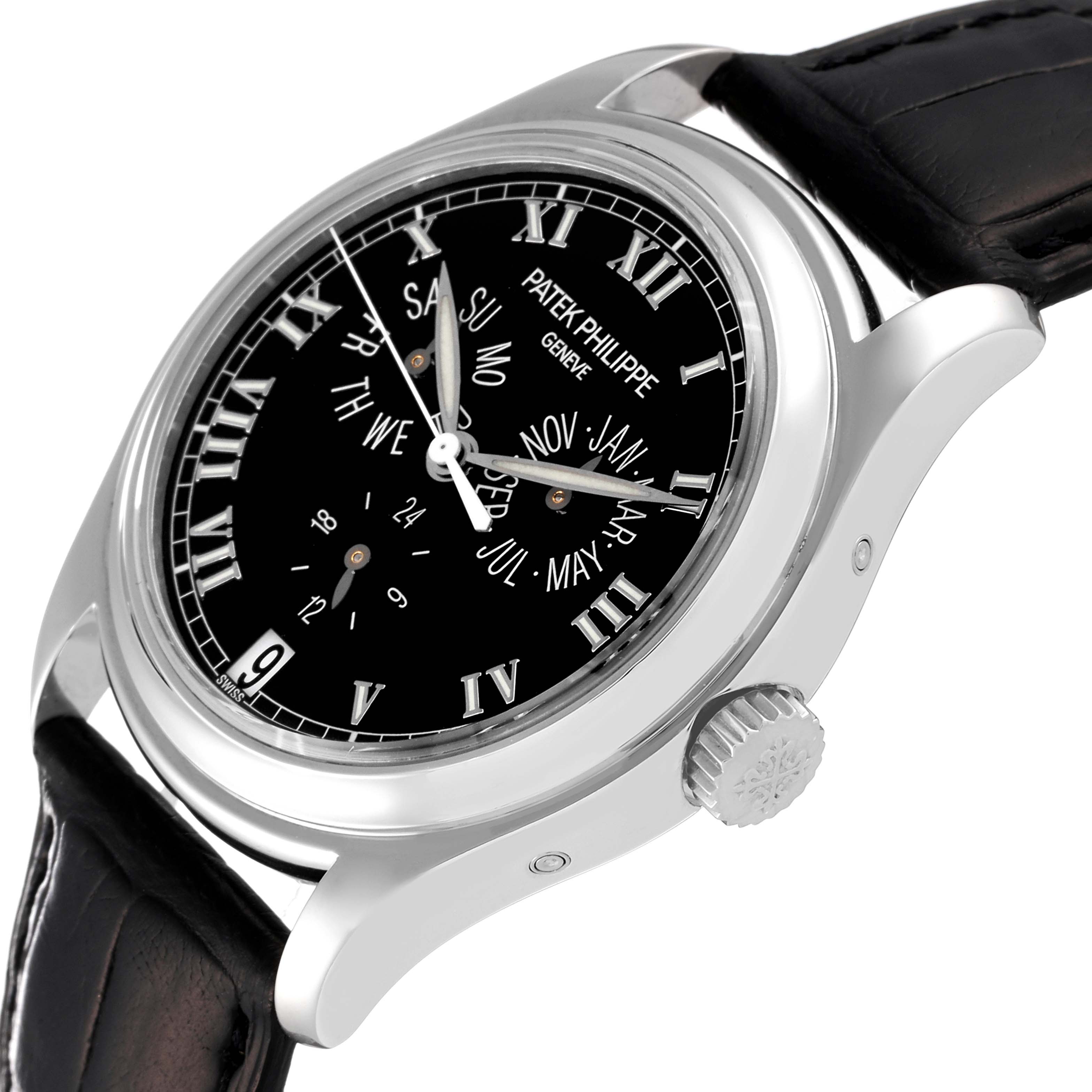 This image shows a side angle of the Patek Philippe Complications 5035P Men's Platinum Black Dial 5035P Men's Platinum Black Dial watch, featuring its black dial, Roman numerals, and leather strap.
